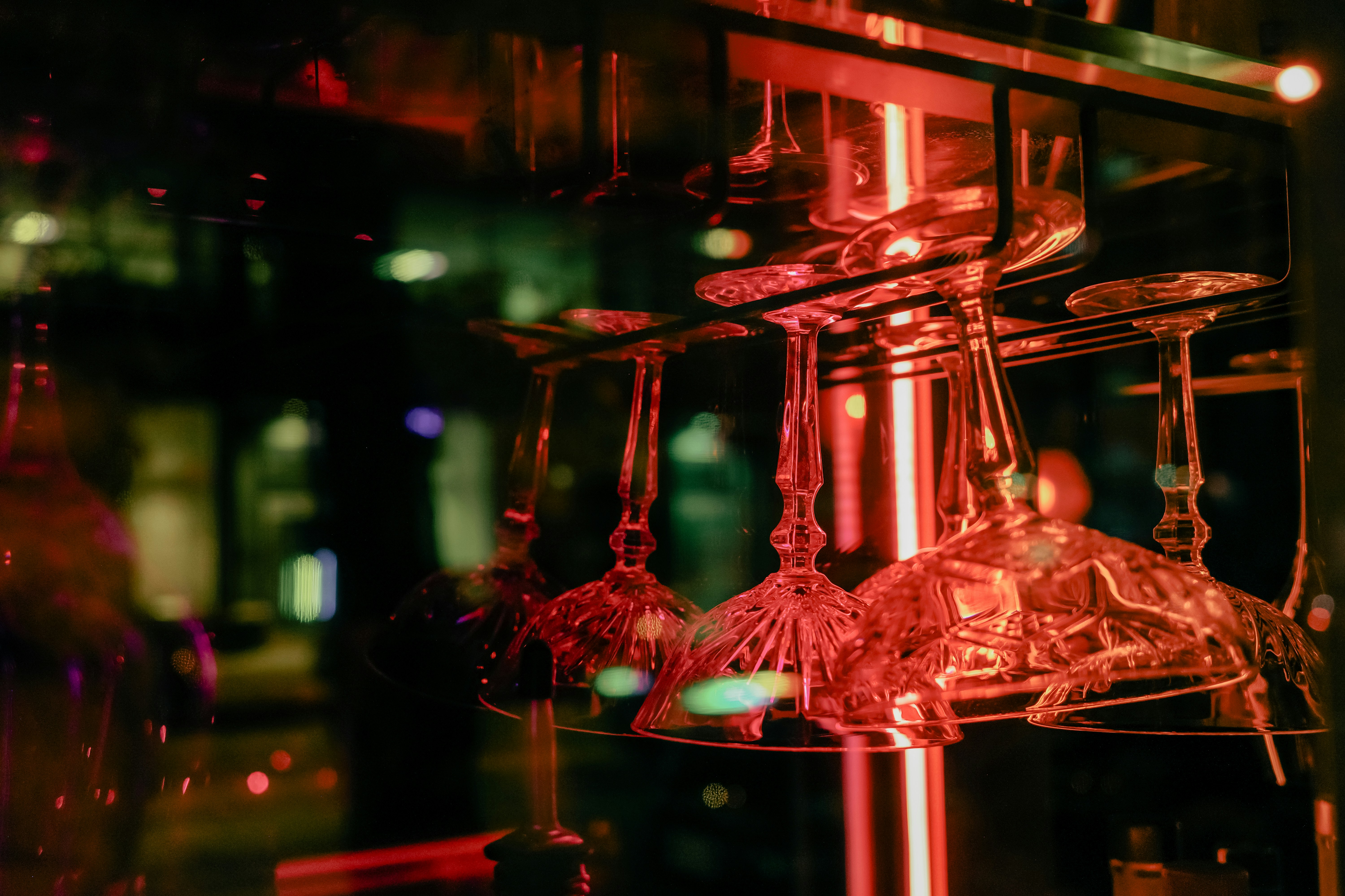 Upside down wine glasses in a bar
