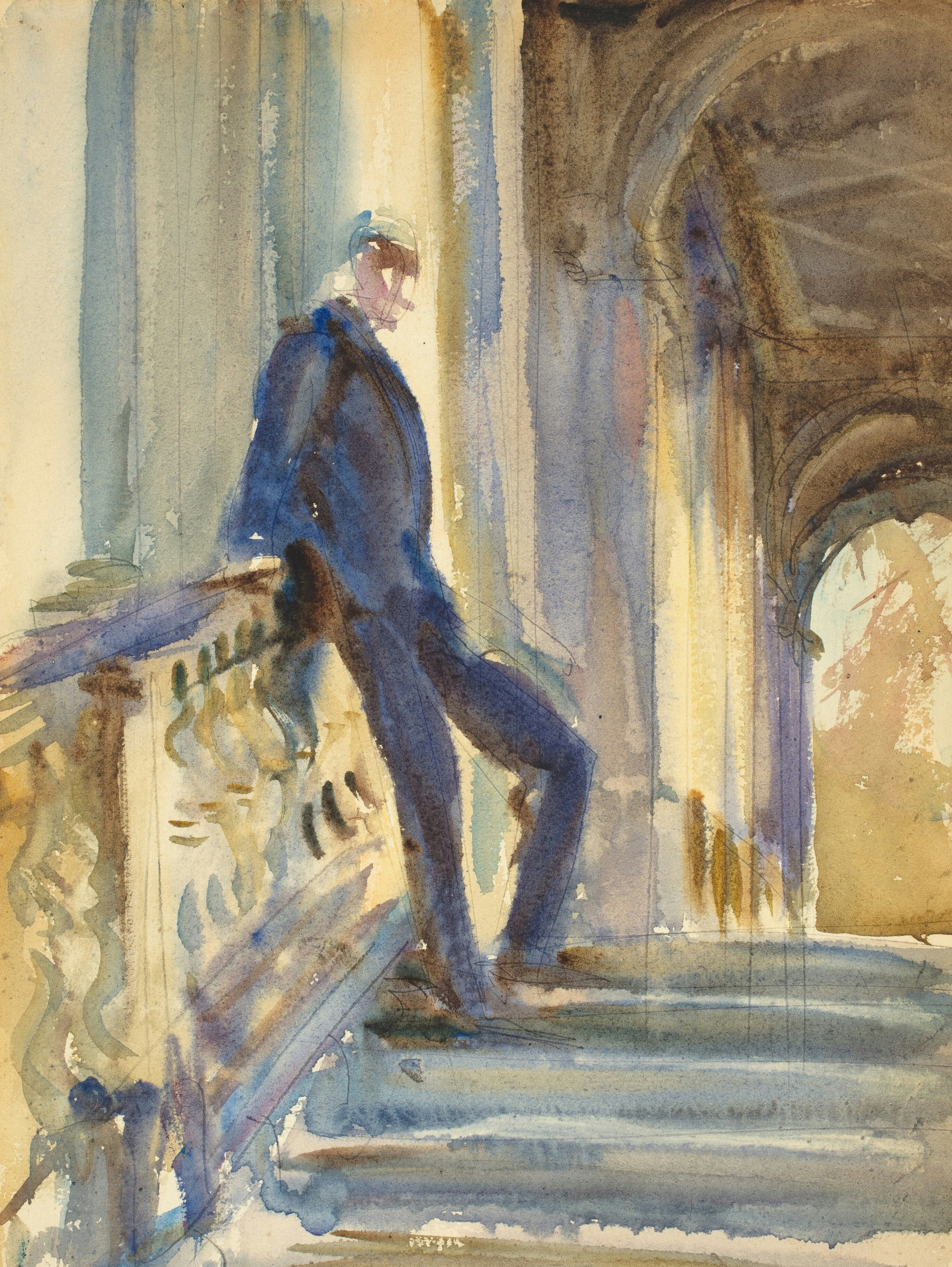 Mann im Anzug, der auf prunkvollen Treppen steht.