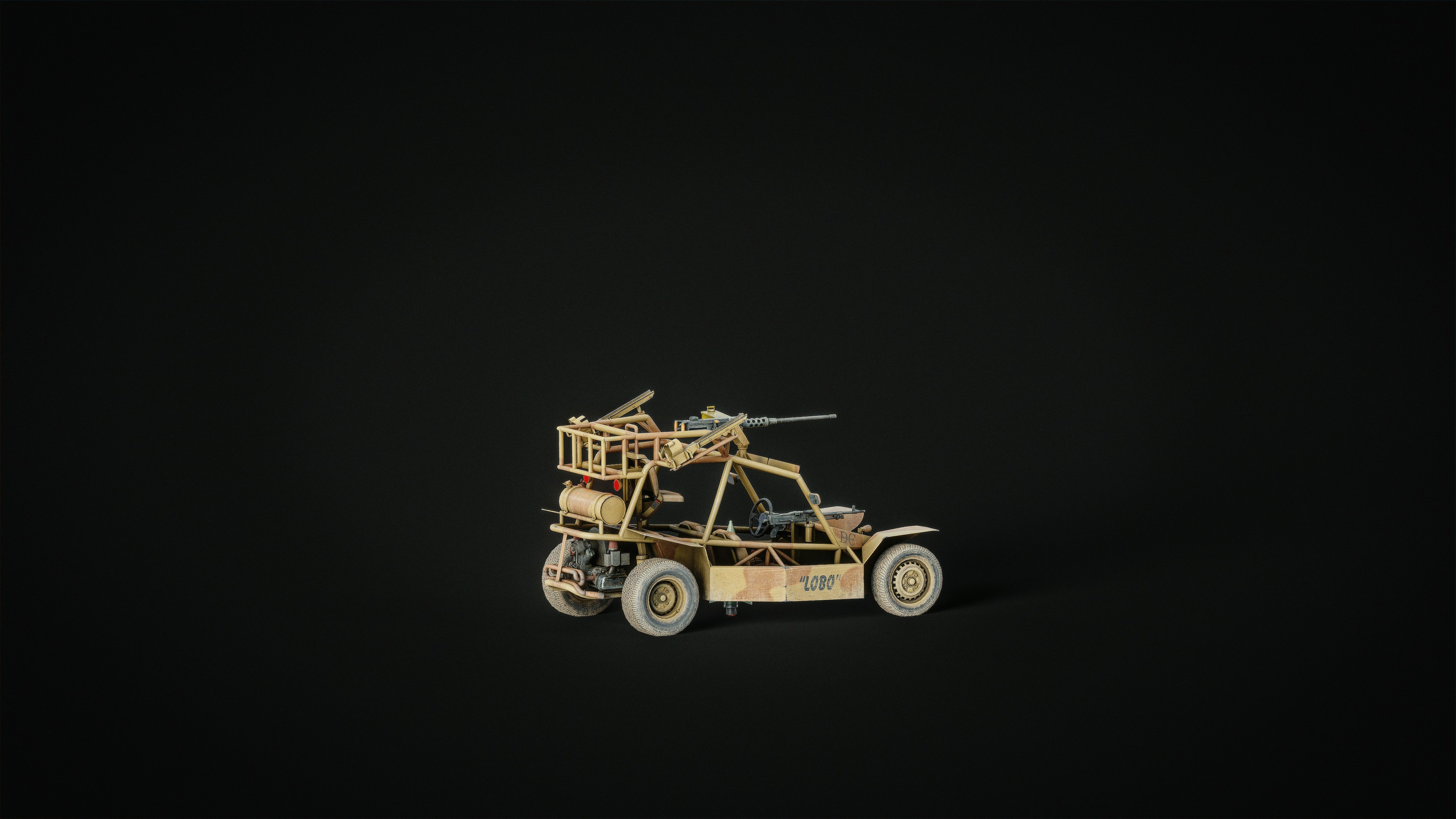 A tan military buggy with a mounted machine gun.