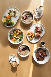 A variety of healthy breakfast bowls and dishes