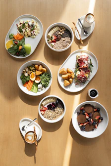 A variety of healthy breakfast bowls and dishes.