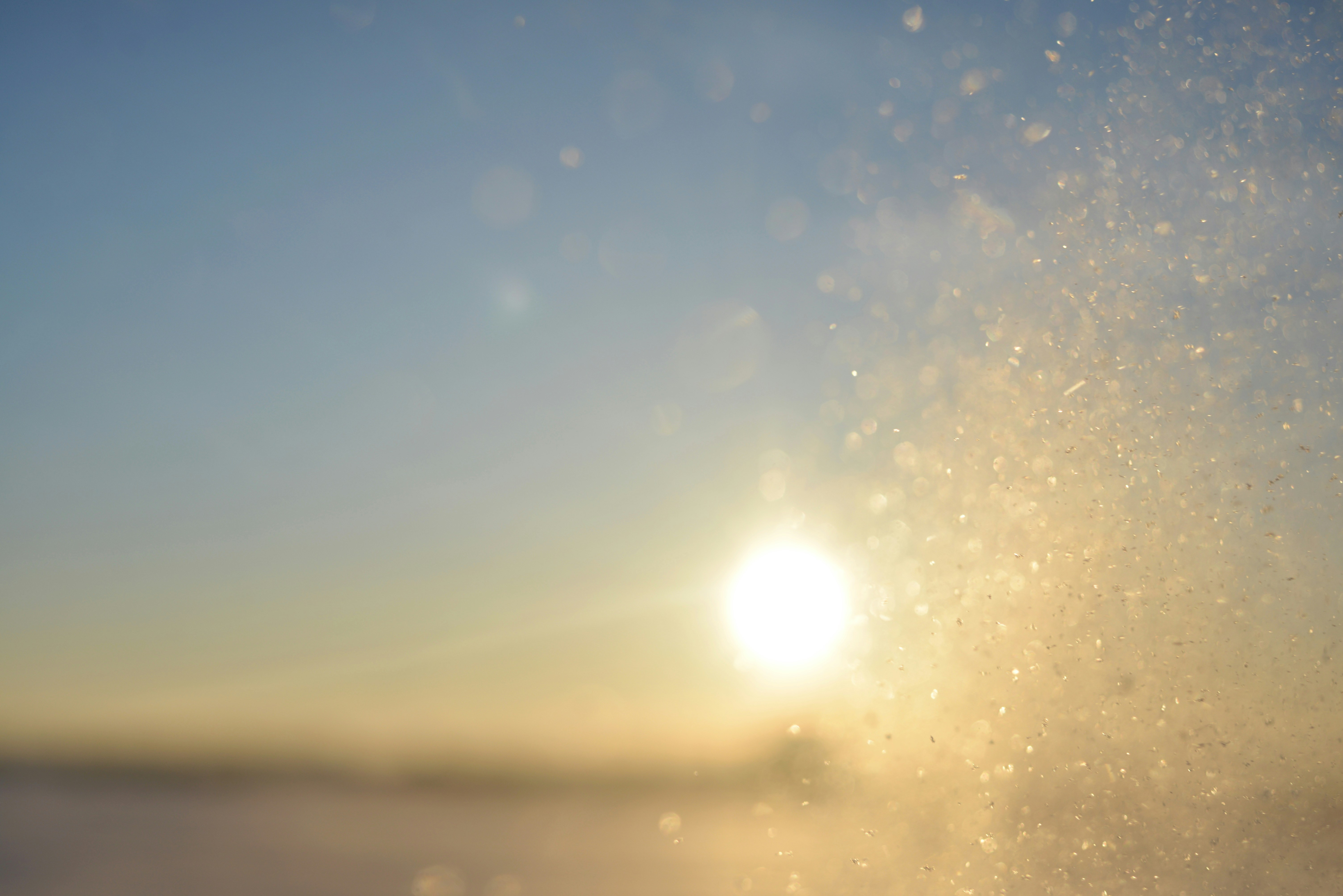 Sun shining through snow particles