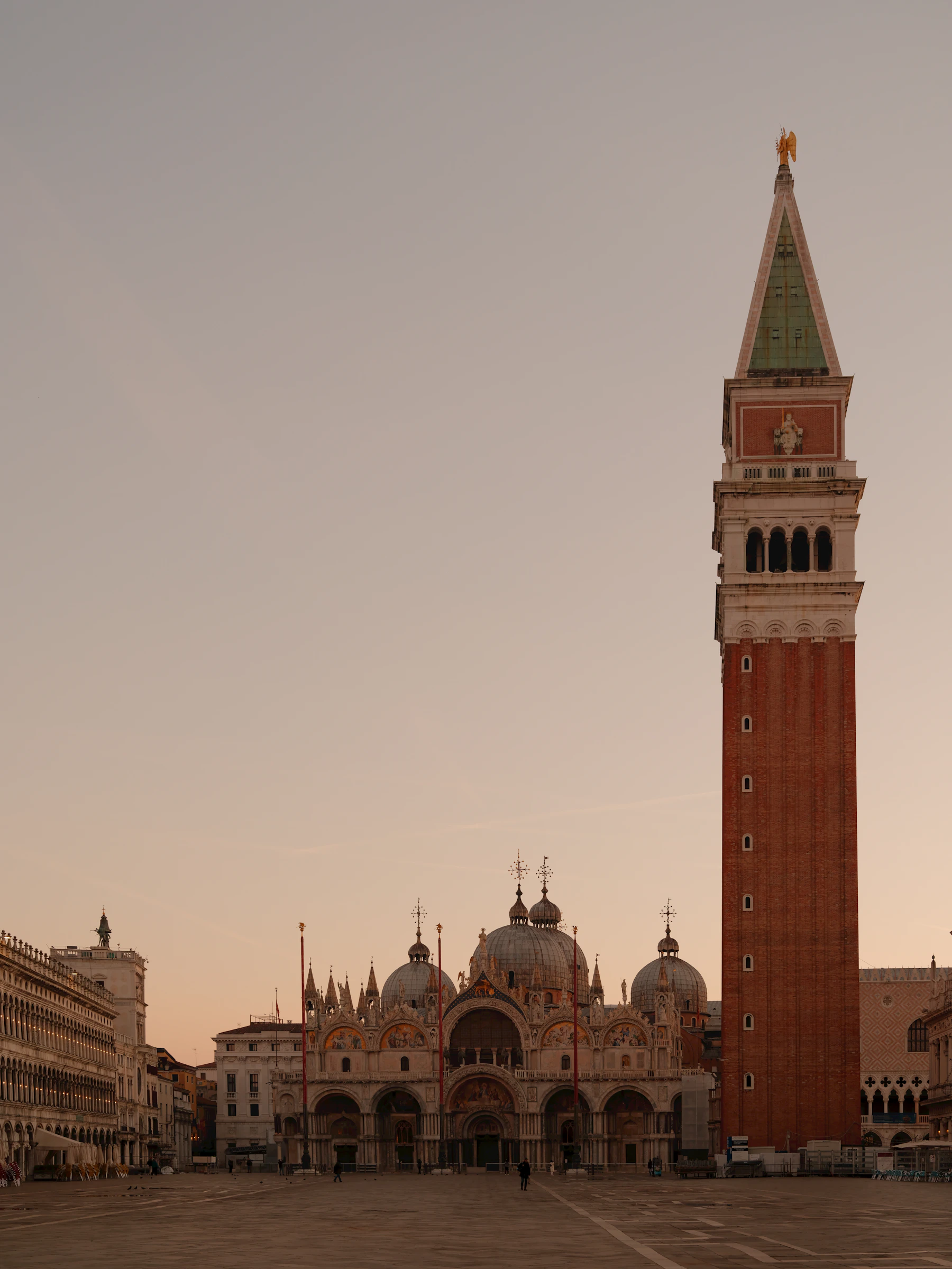 St Mark's Square, its campanile and basilica in the quiet light of dawn