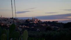 Distant town on a hill at dusk