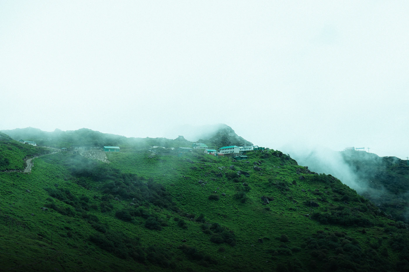 Misty mountain slopes near Nathula Pass in Sikkim