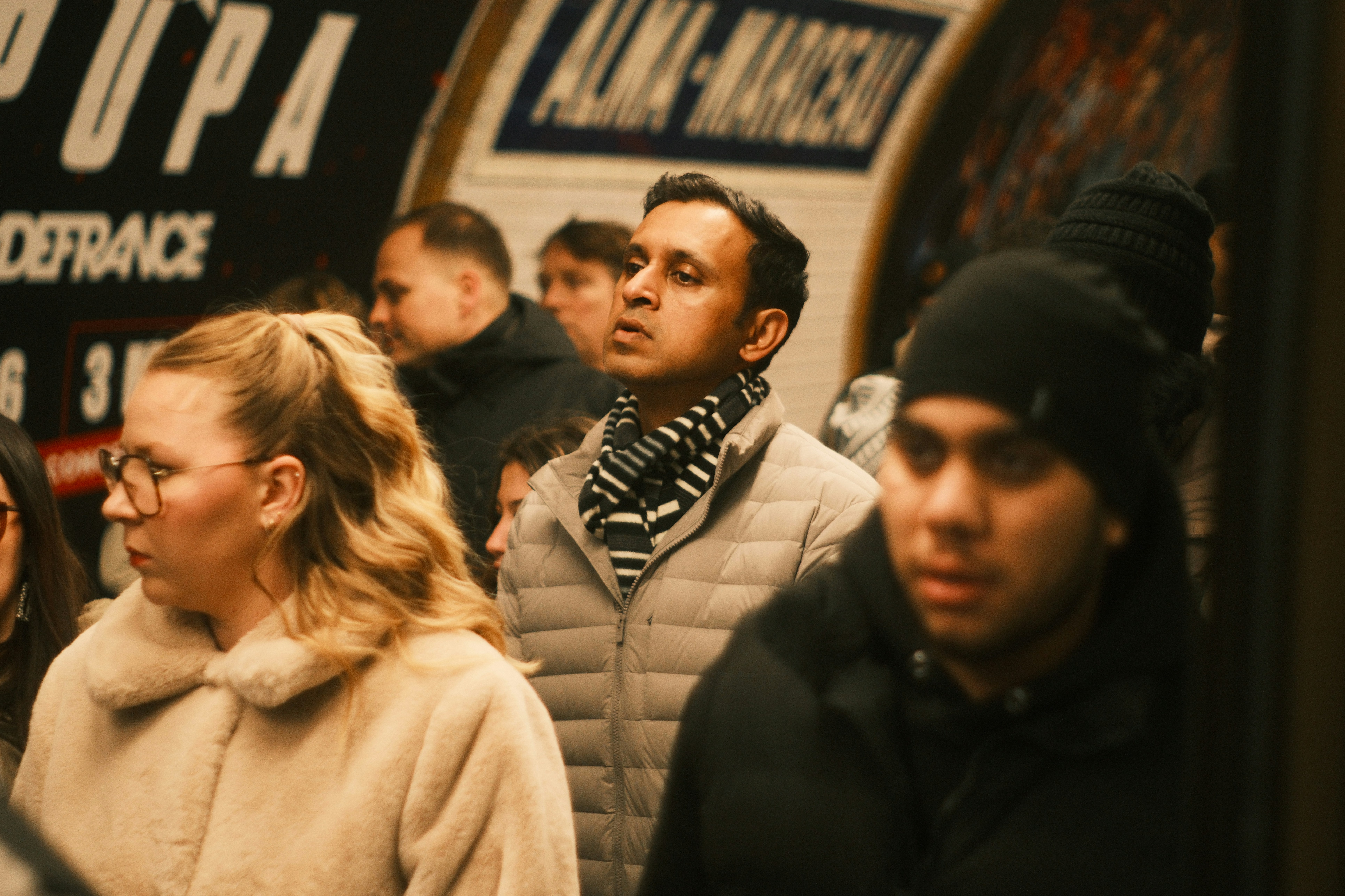 A diverse group of people walking outdoors