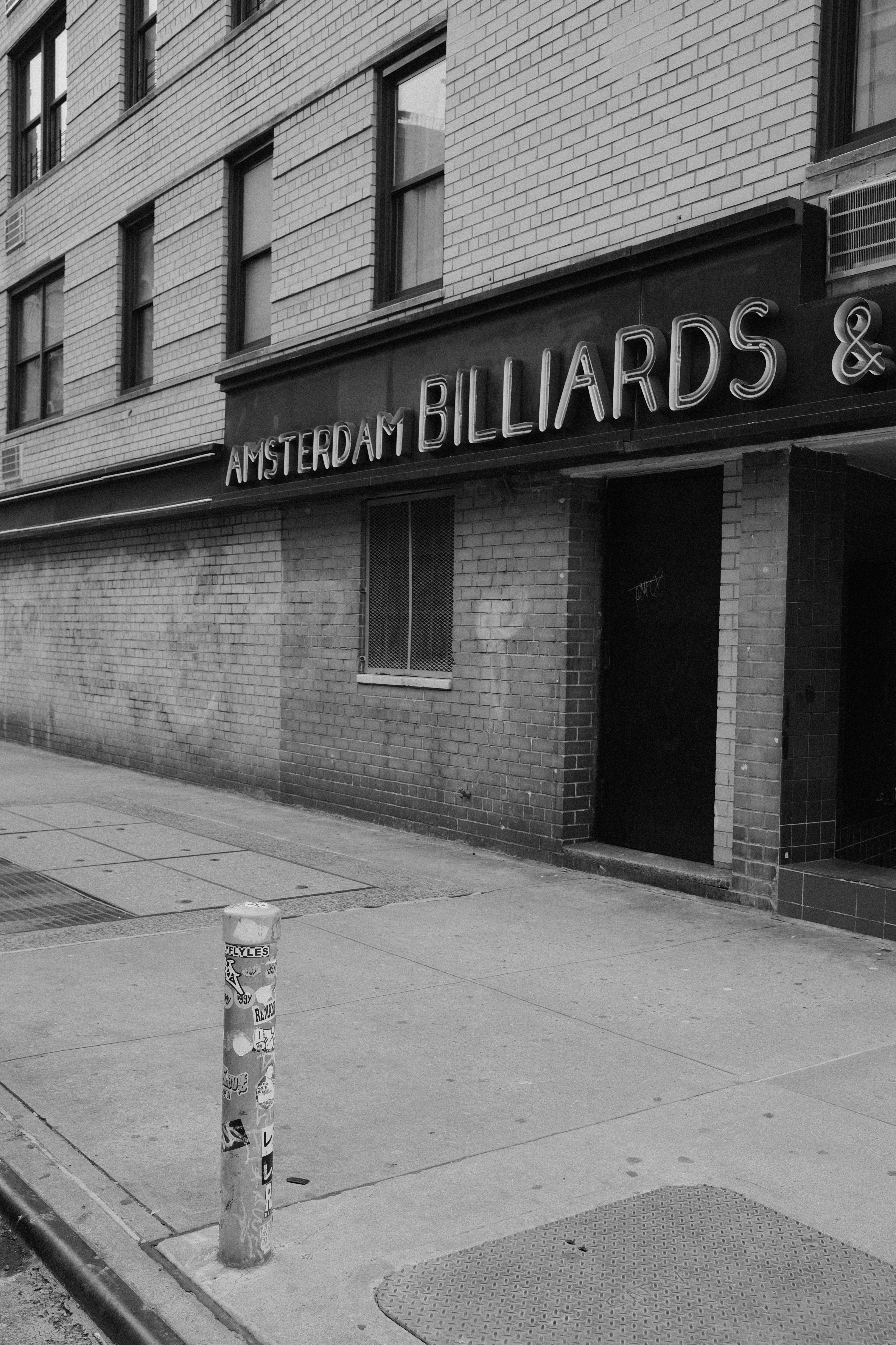 Amsterdam billiards entrance in black and white