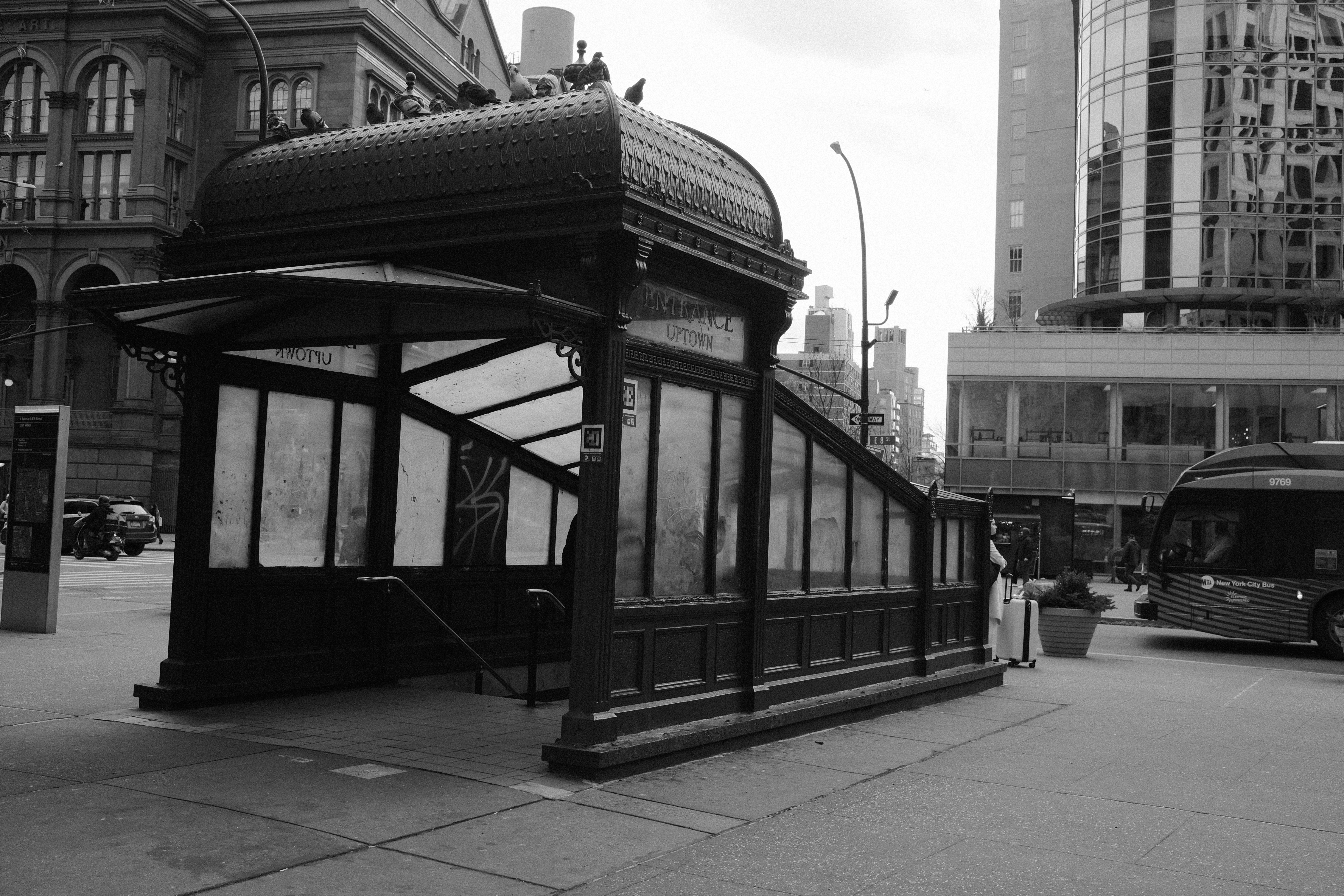 An old subway entrance in a city street