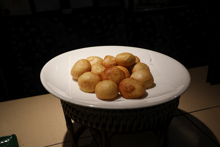 Golden baked pastries on a white plate