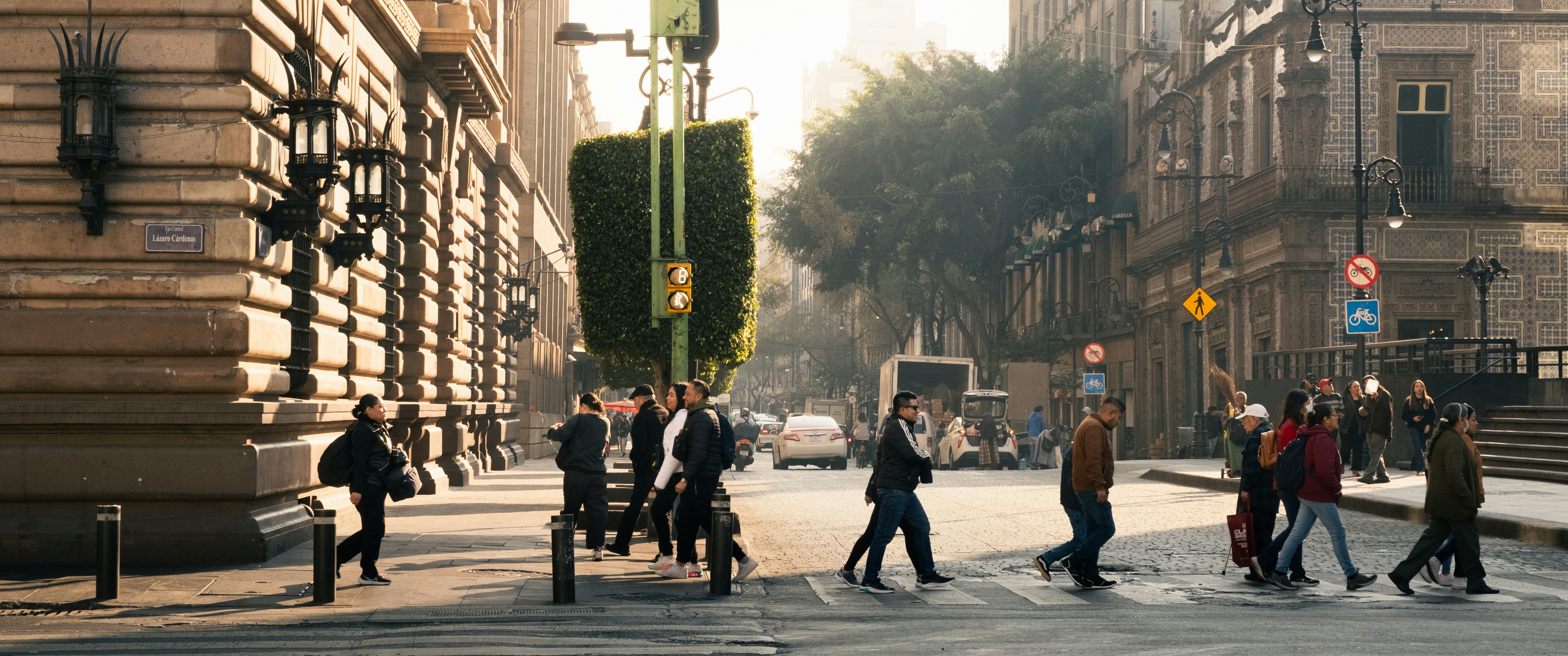 People crossing a street in Mexico City historic center