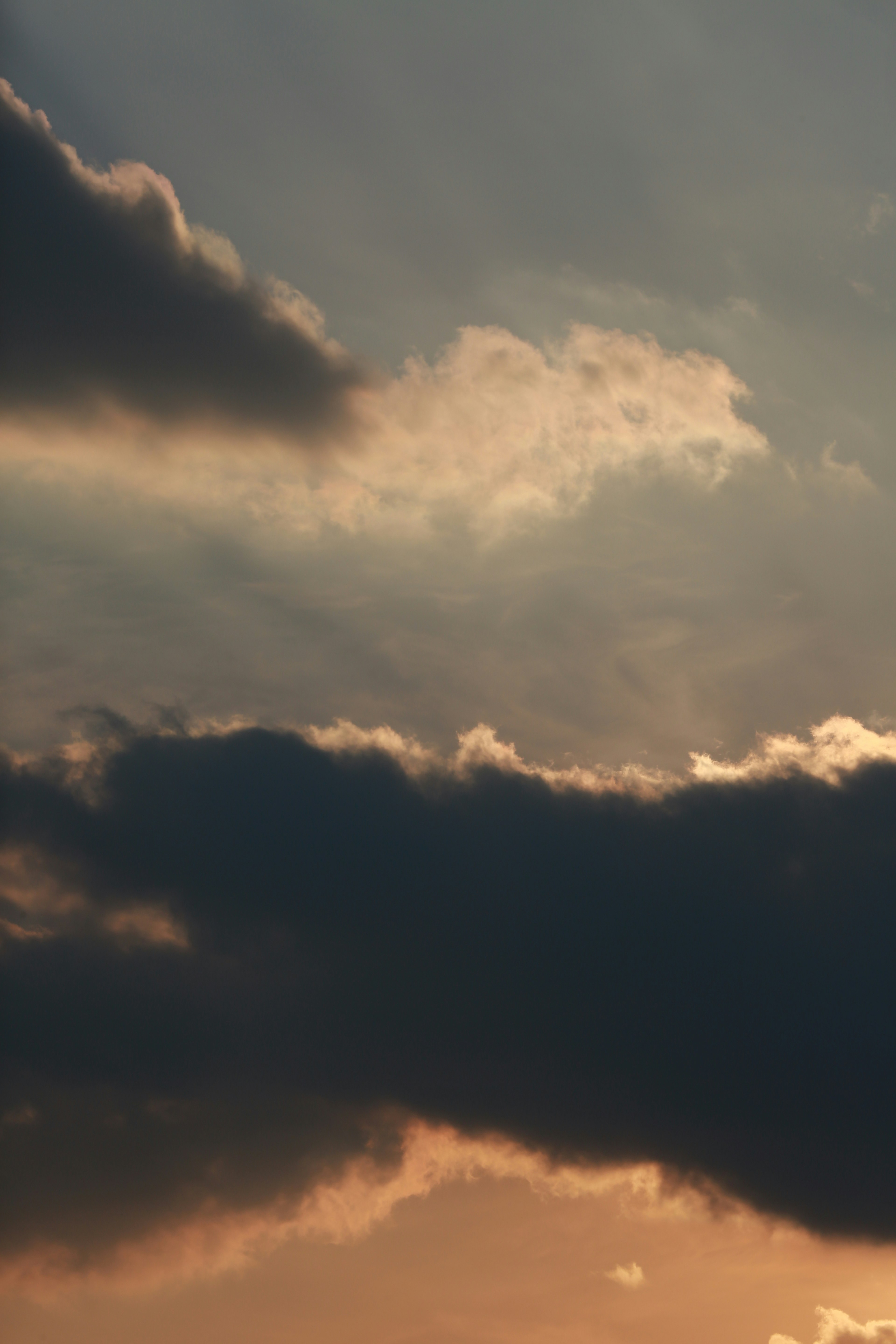 Dark clouds illuminated by sunset light