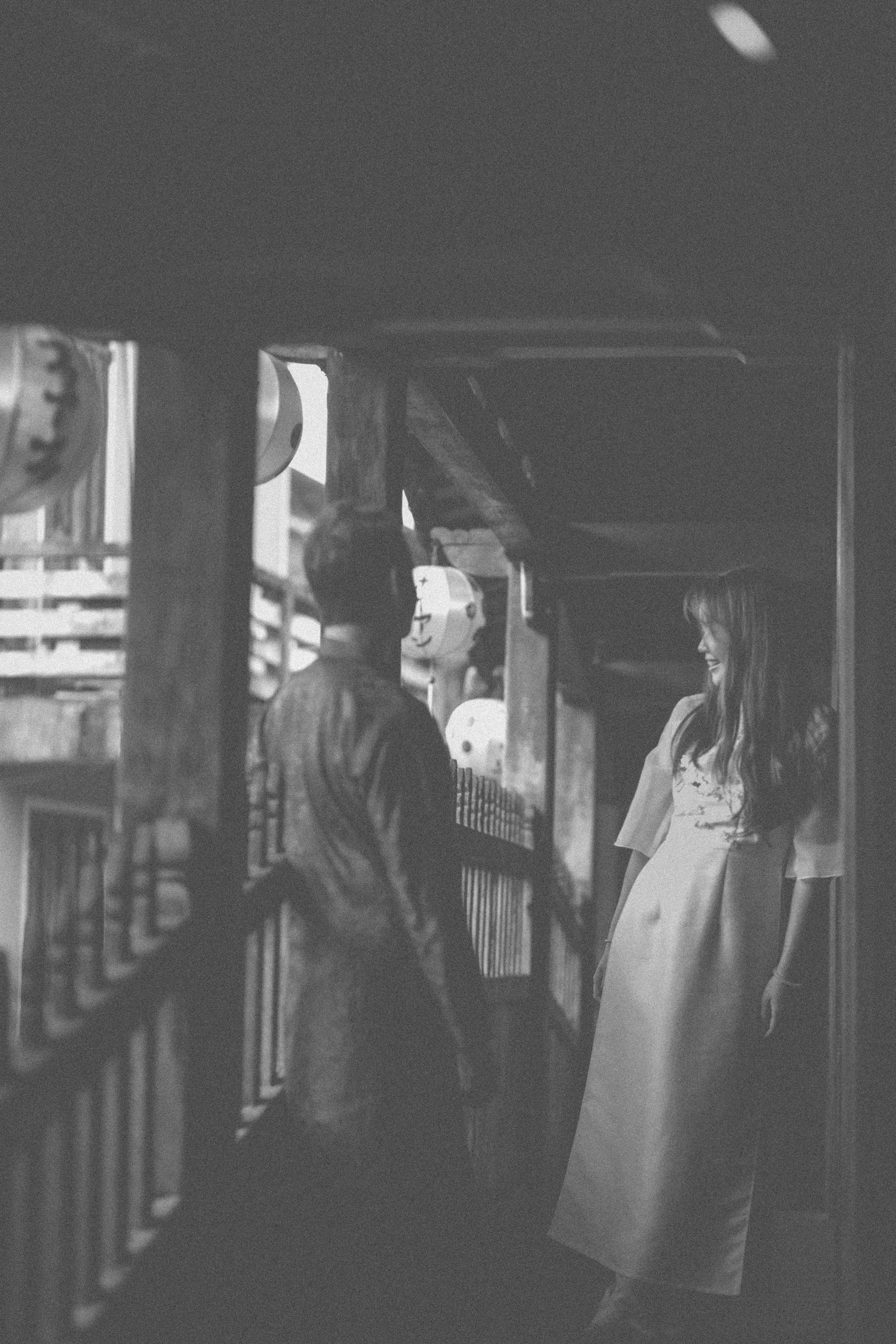 Couple standing on a wooden balcony