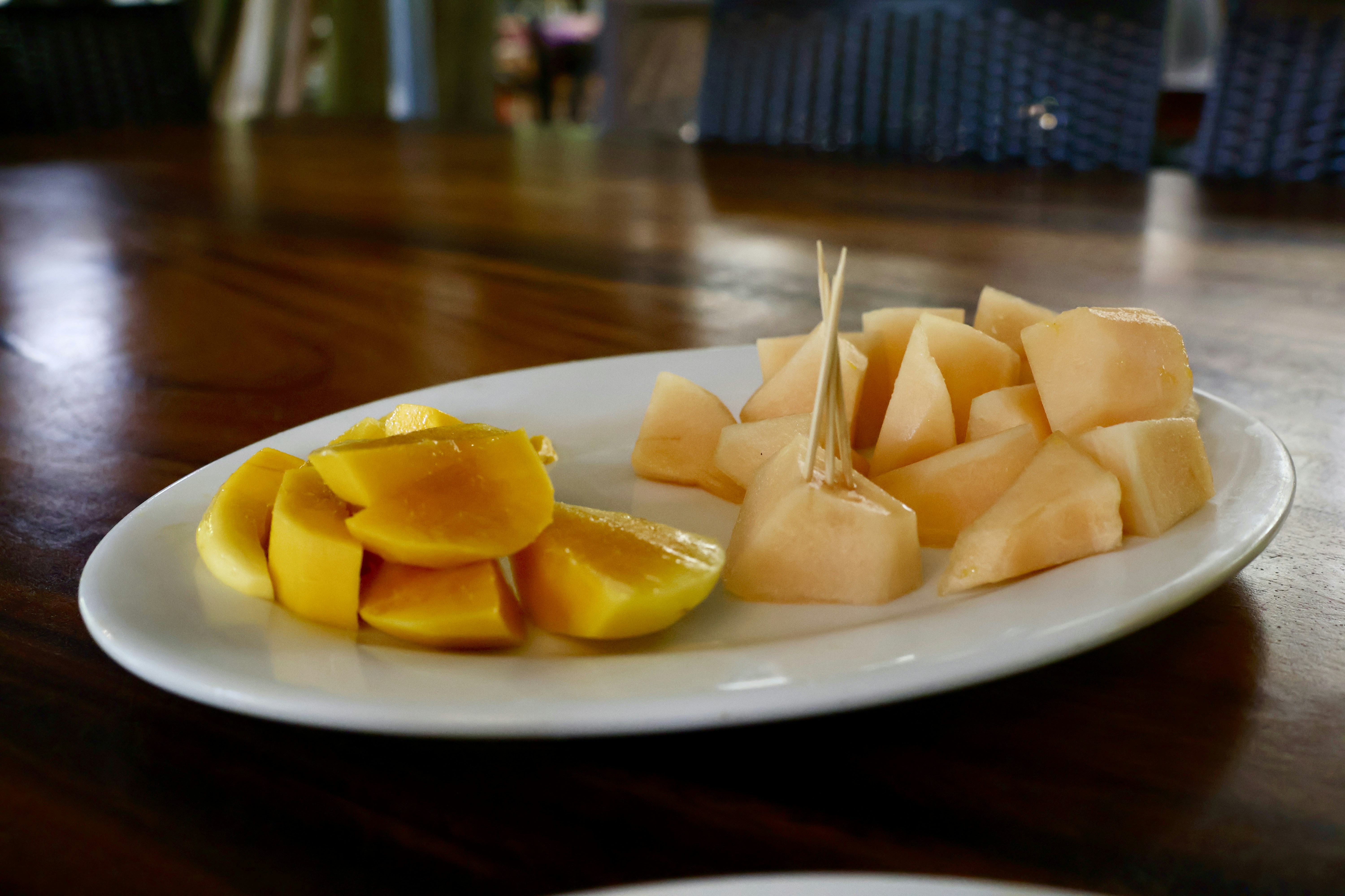 sliced mangoes and strawberries for a sweet smoothie - how to make a smoothie sweeter without sugar