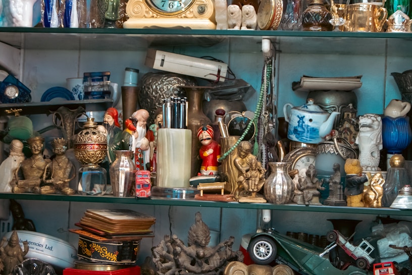 Shelves filled with various antique trinkets and collectibles.
