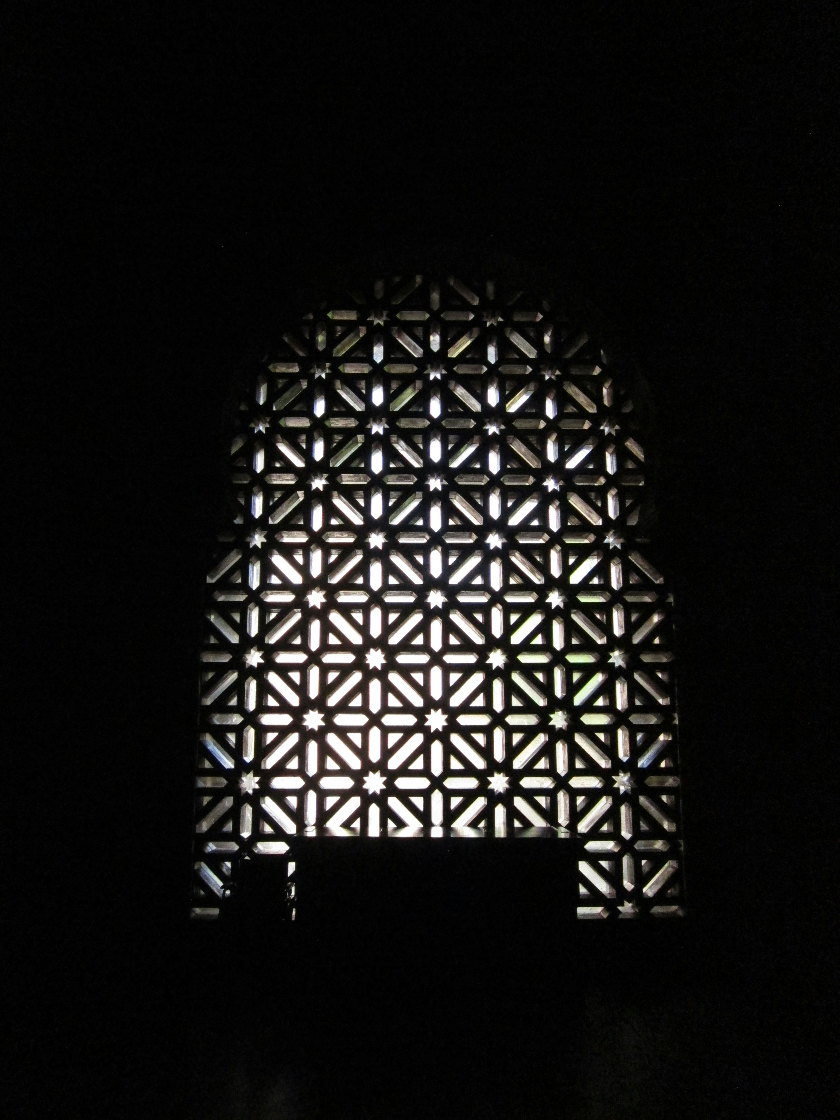 Intricate geometric pattern illuminated from behind