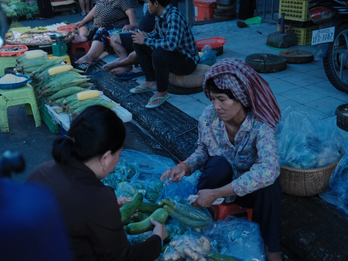 Vendors selling produce at an open-air market — Twiga Foods built its business on supplying stalls like these