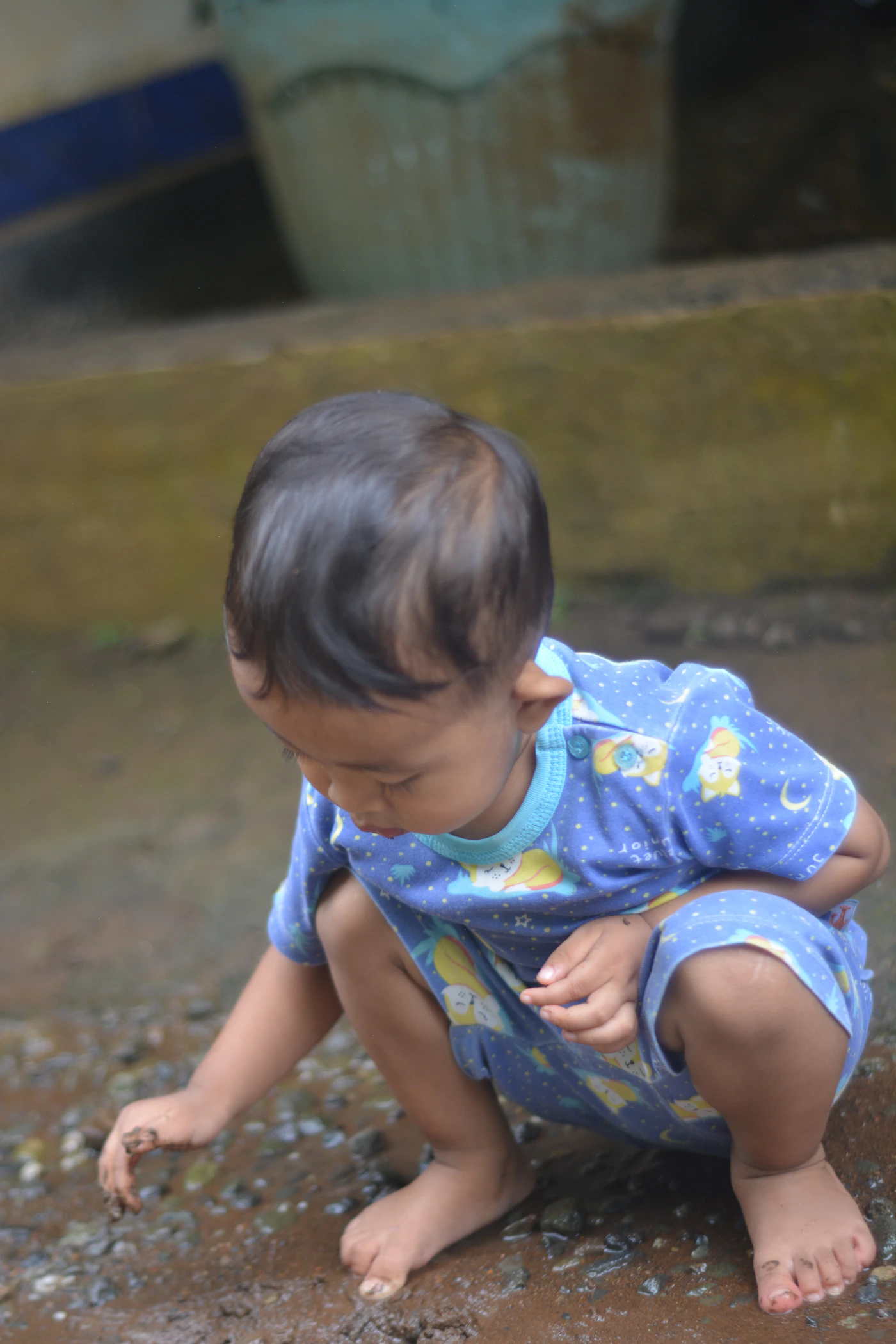 Child playing calmly outdoors