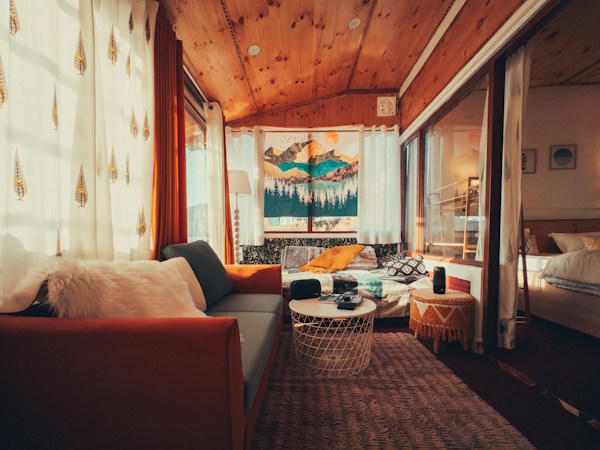 Cozy furnished living room set up for guests, the kind of space offered on short-term rental sites
