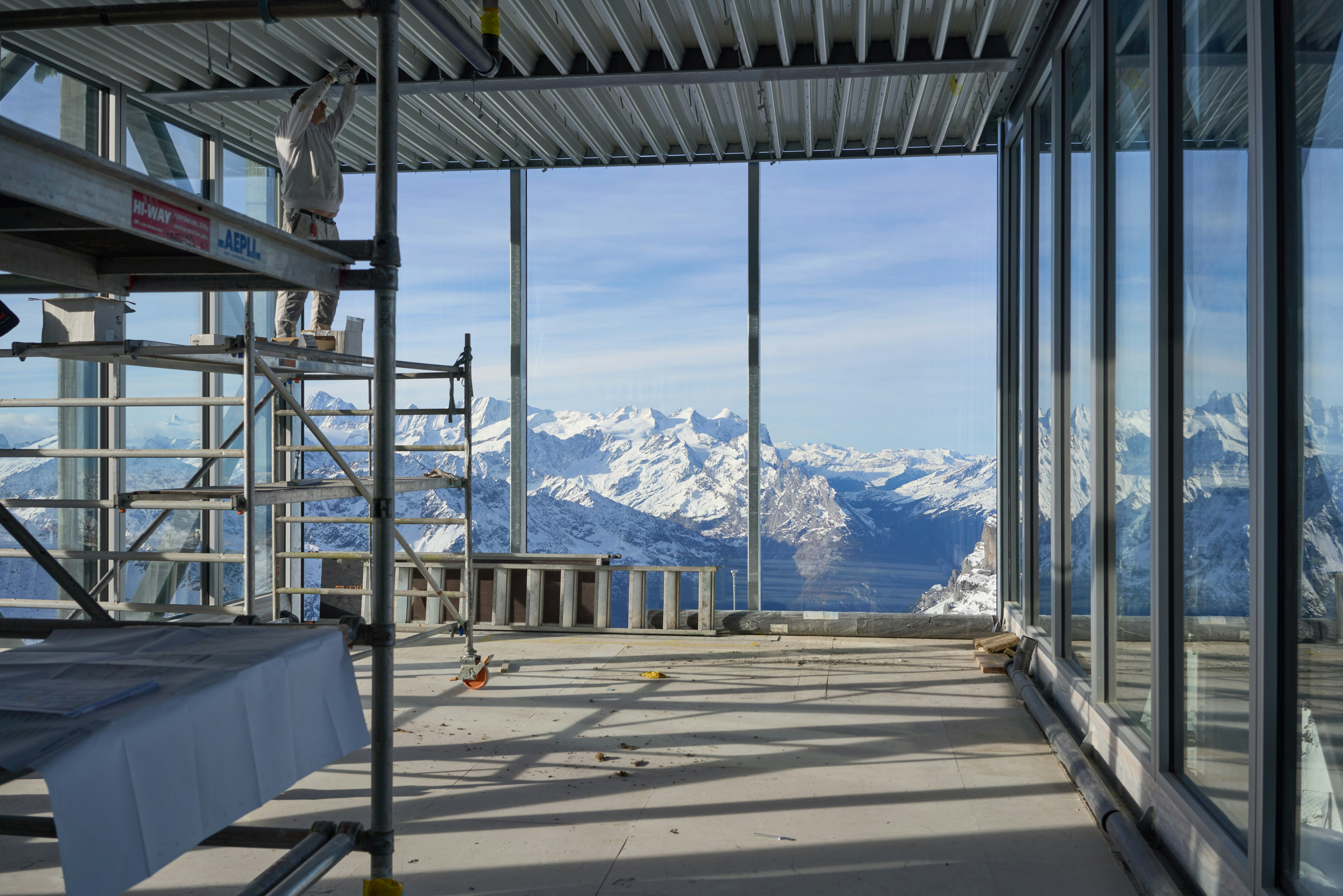 Construction inside with mountain view through windows