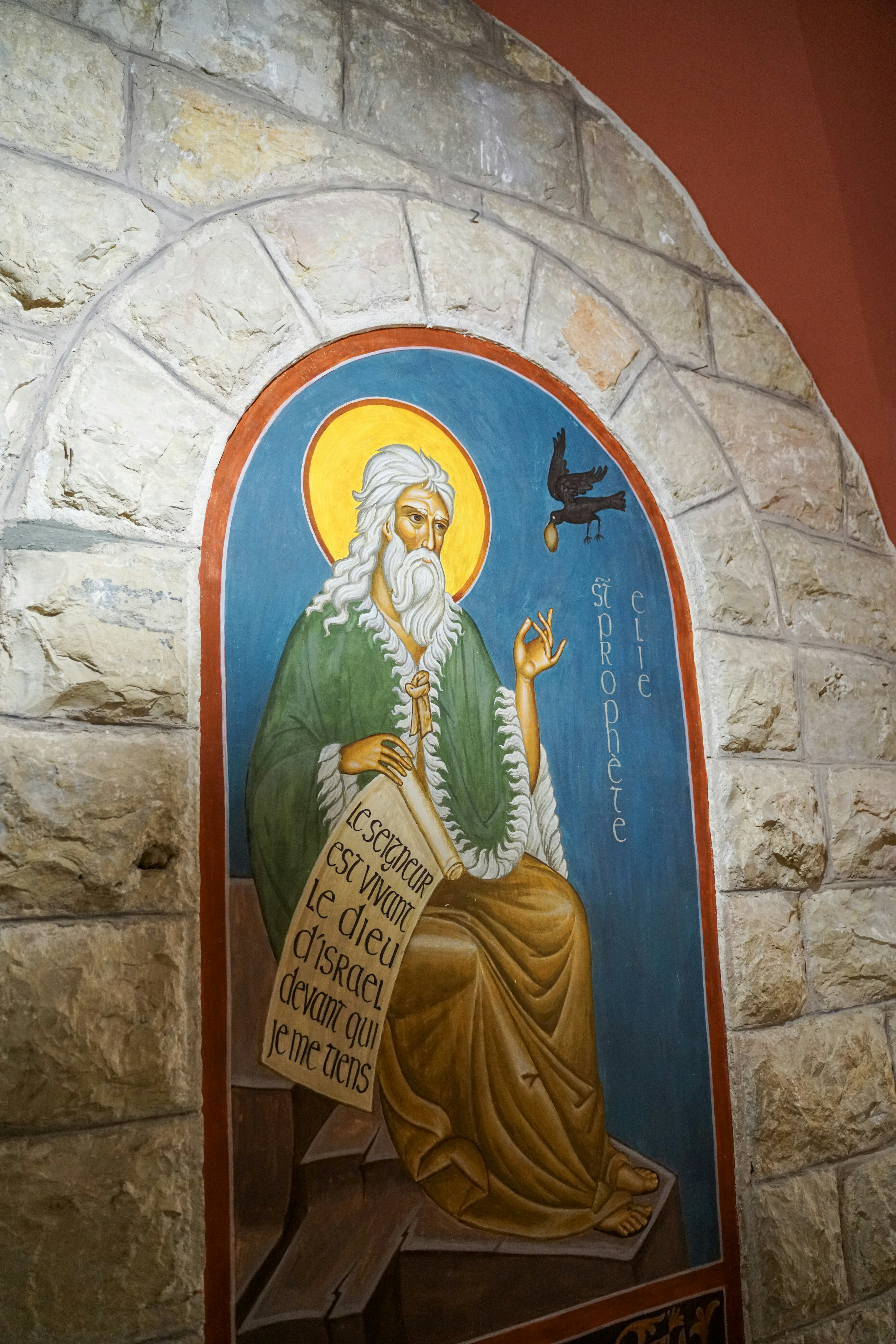 Religious mural of a prophet with a bird