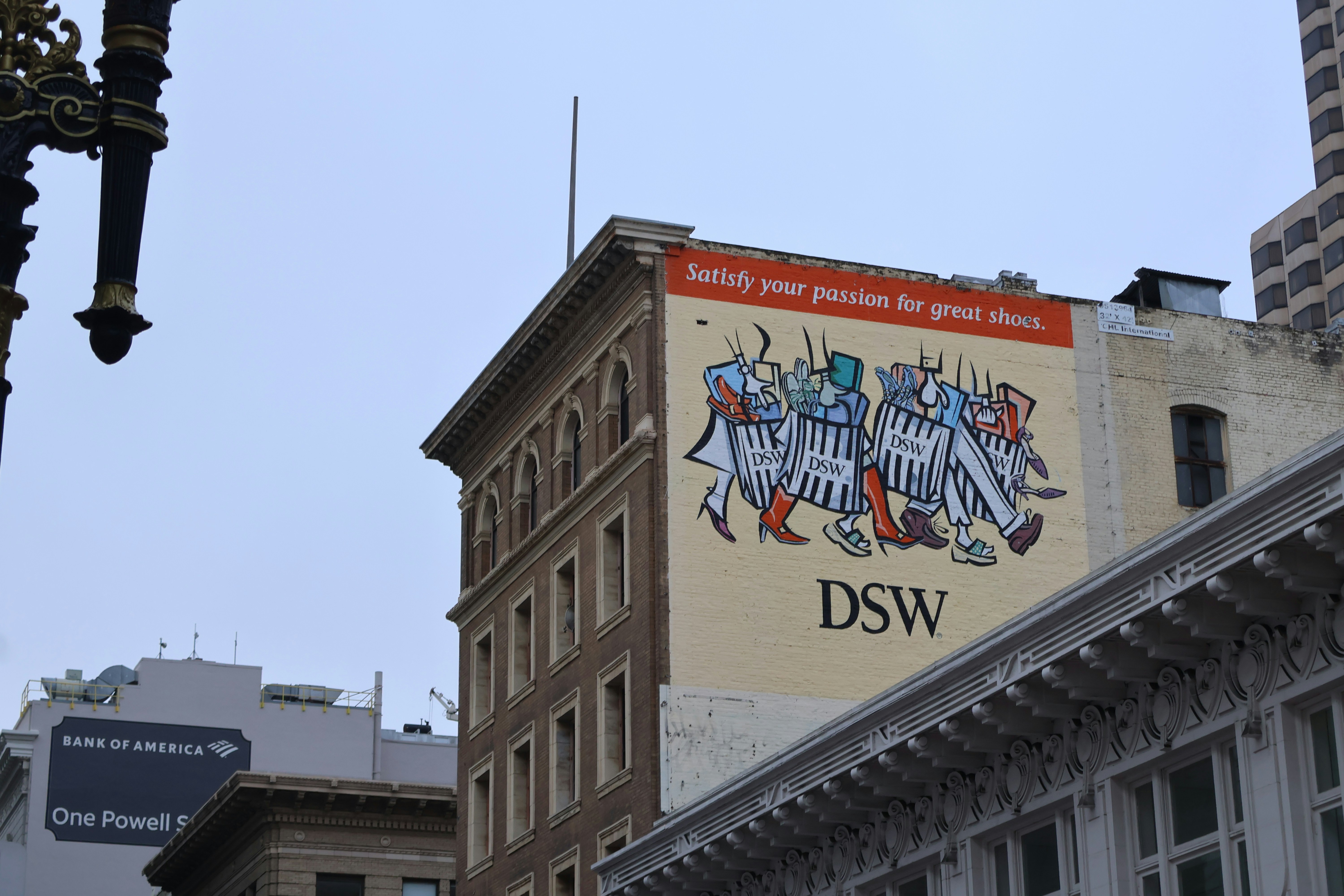 Building mural with dsw logo and marching figures