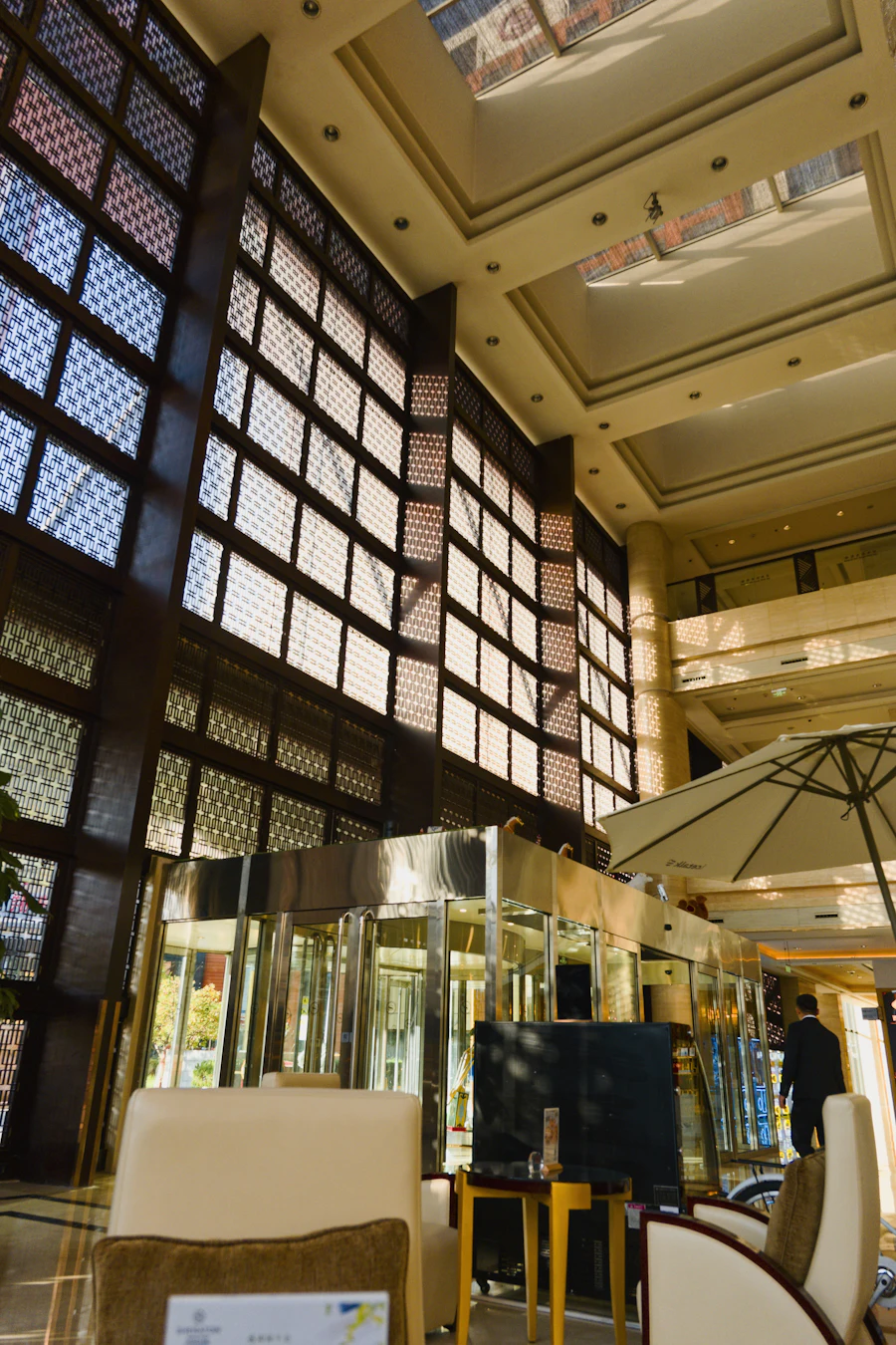 Hotel lobby with tall glass windows