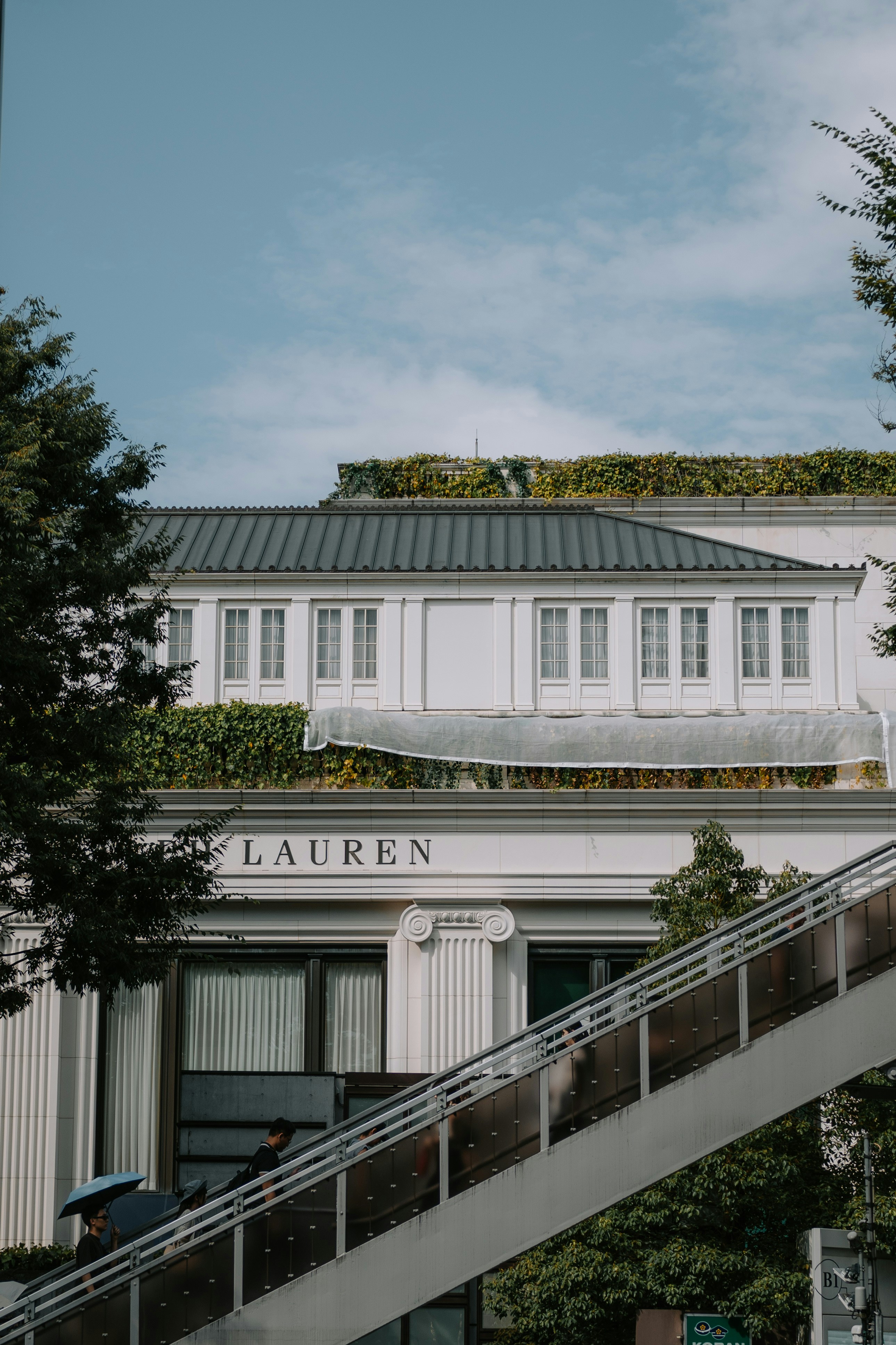 Modern building with "lauren" sign and windows