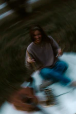 Young woman laughing during a picnic outdoors