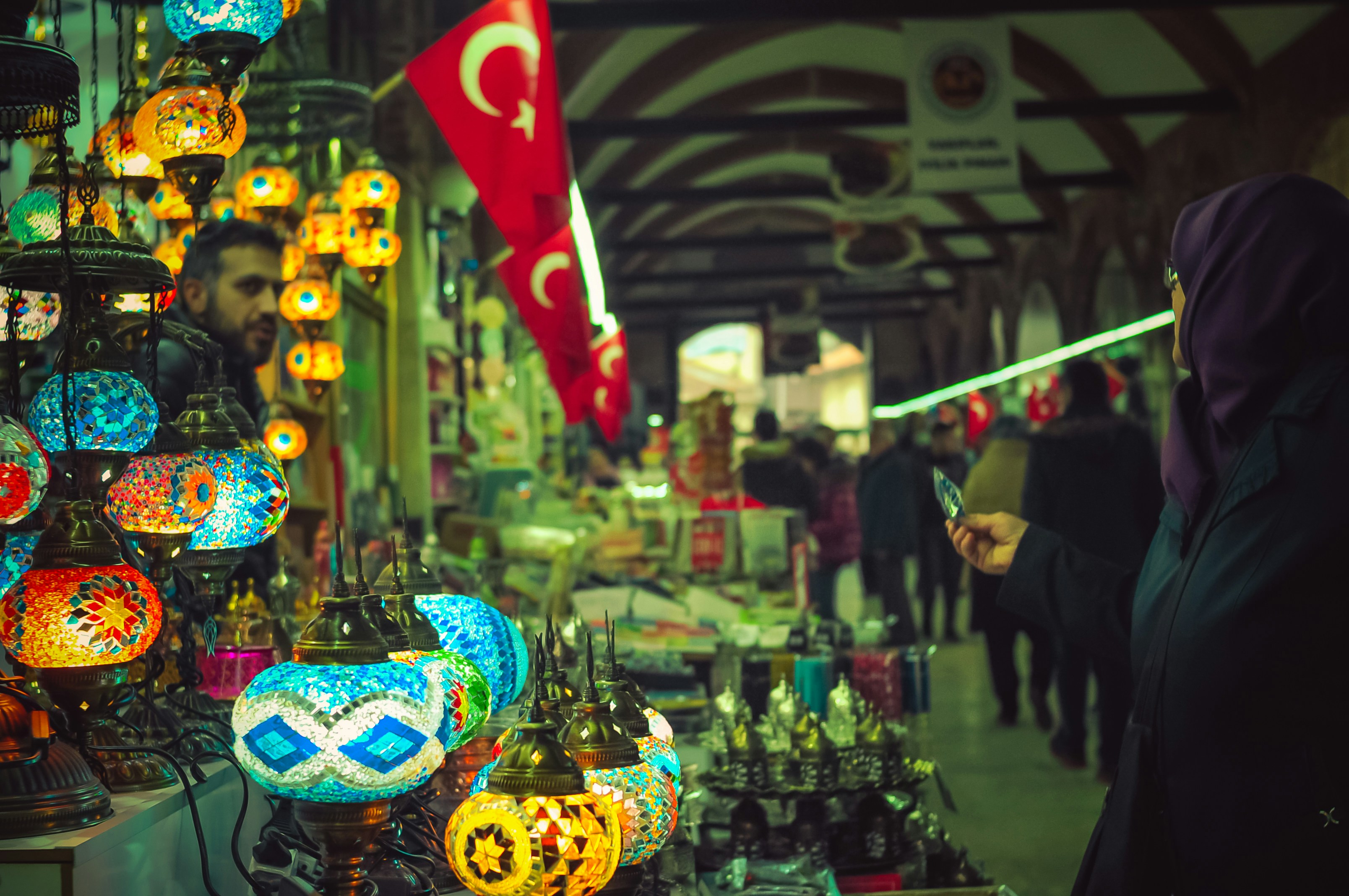 Colorful turkish lamps displayed at a market stall.