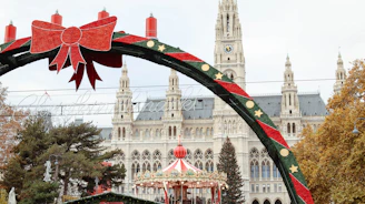 Christmas market arch with carousel and city hall