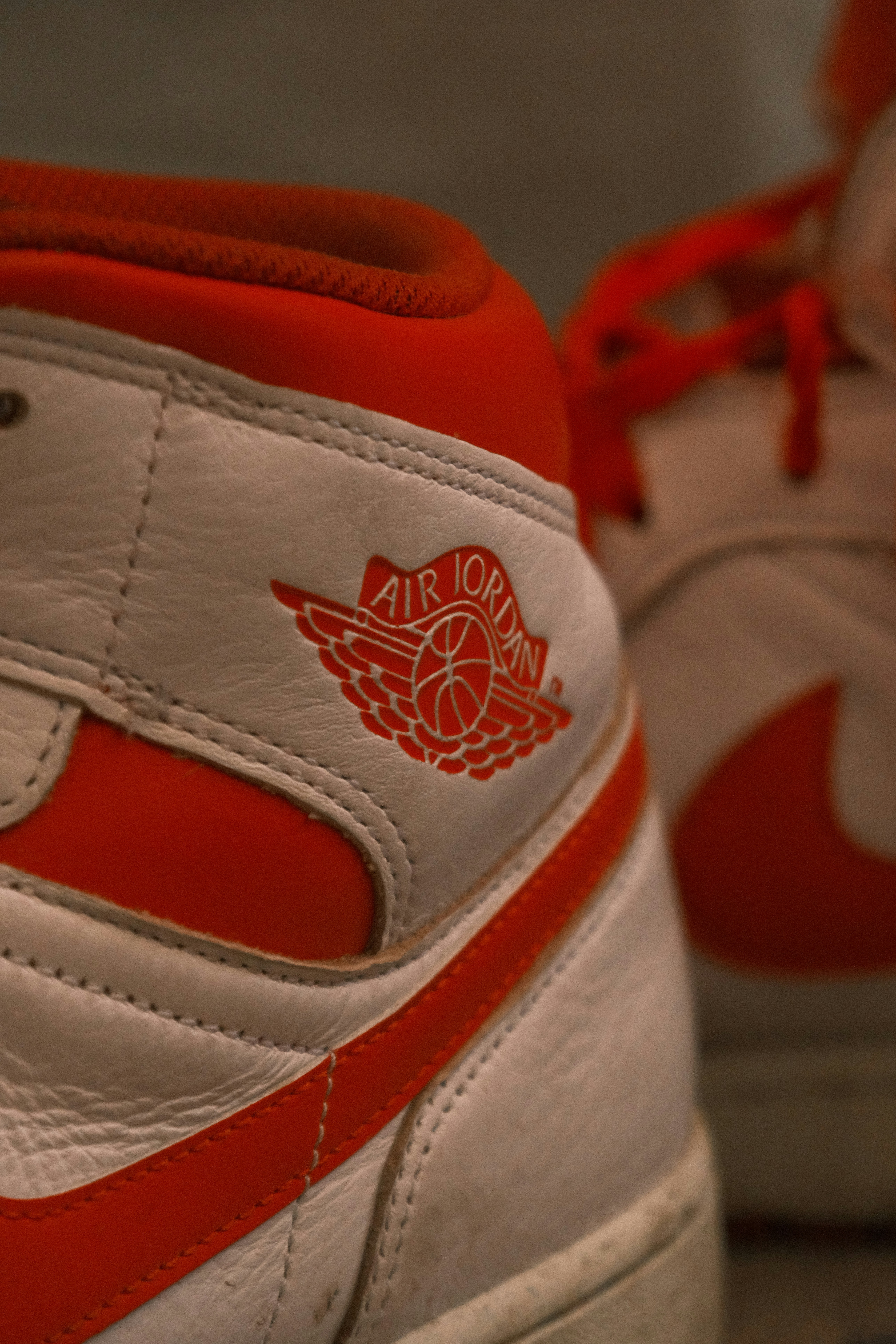 Close-up of white and red air jordan sneakers