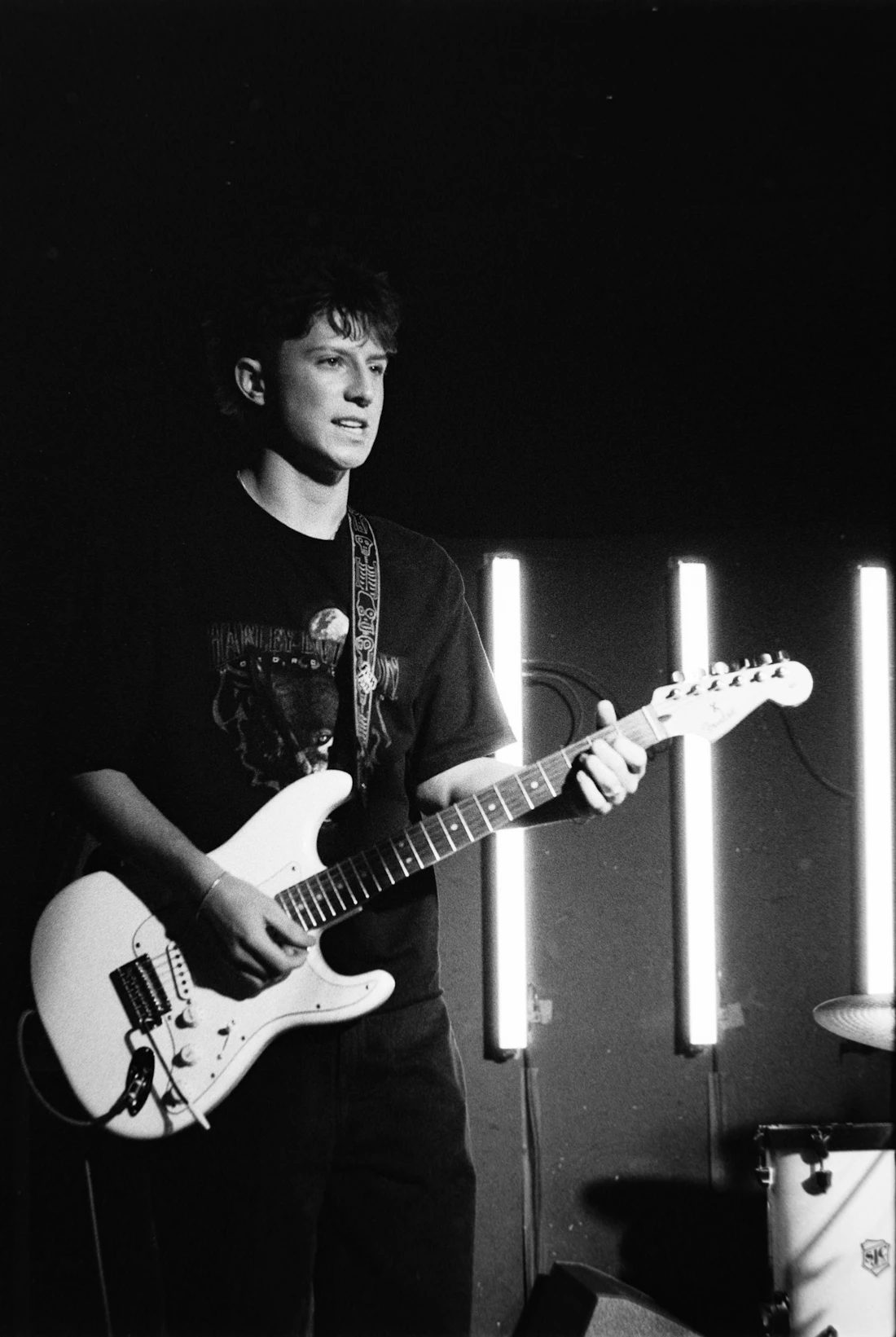 Young musician playing an electric guitar
