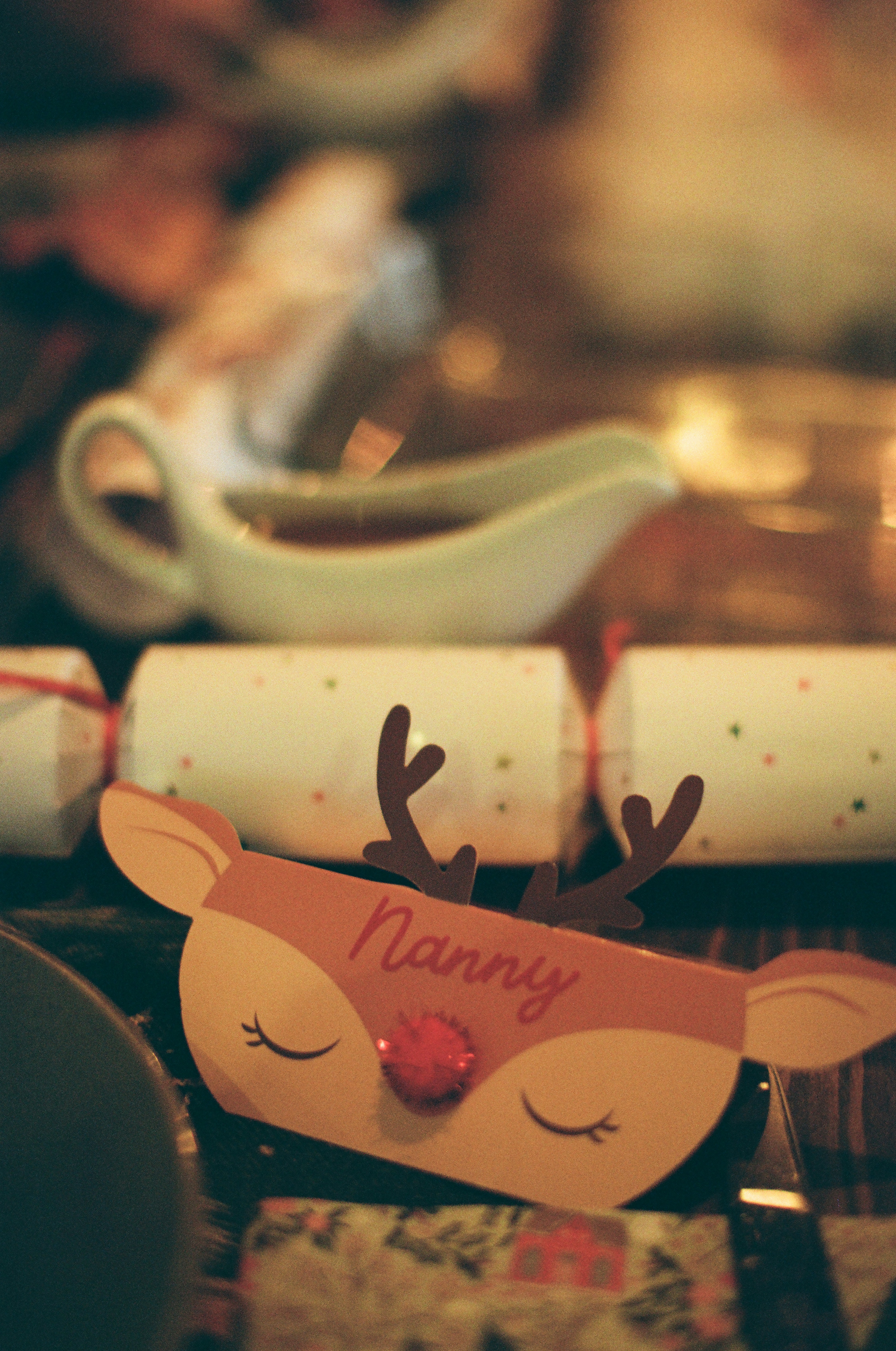 Christmas cracker with reindeer design and 'nanny' name