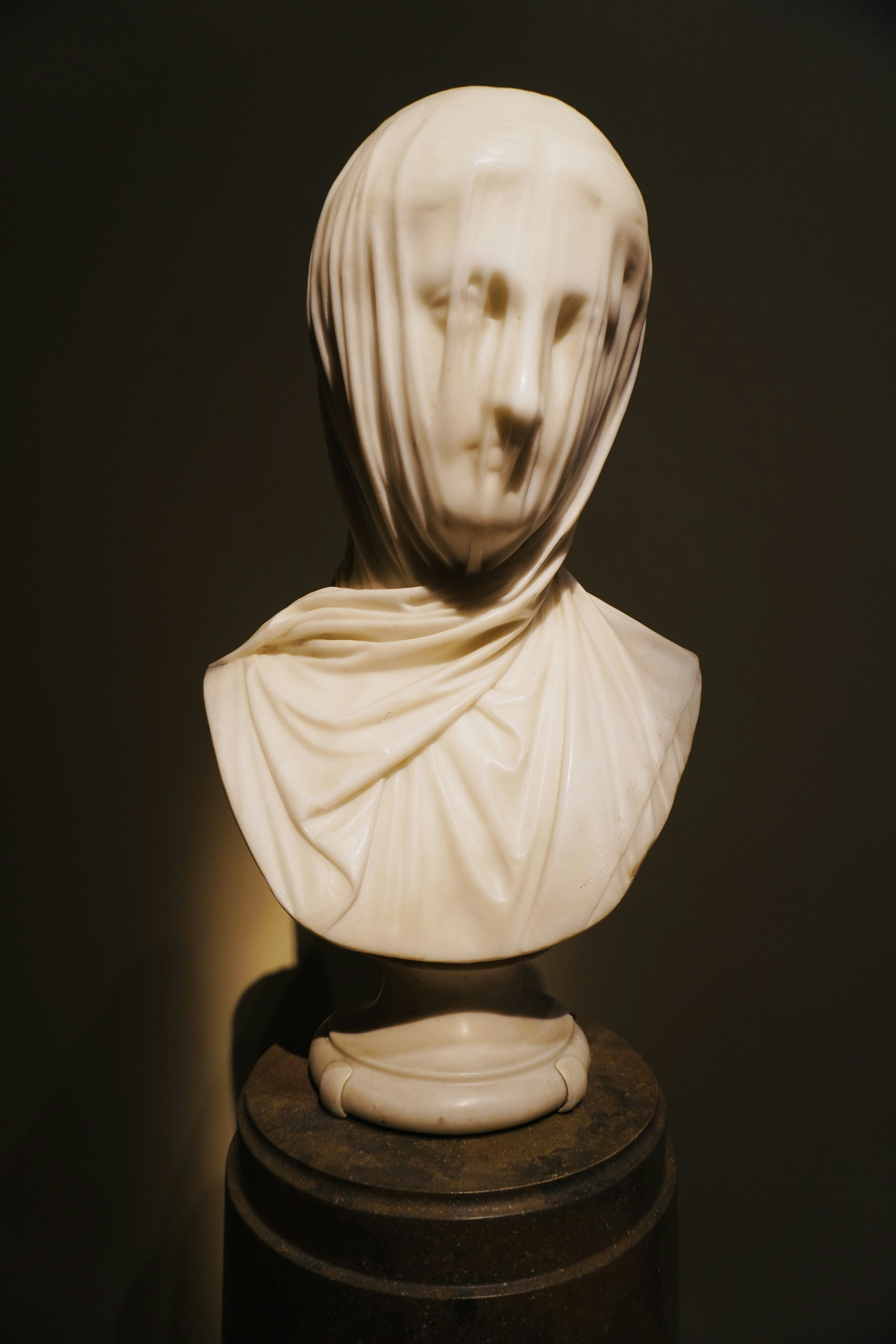 Marble bust of a veiled woman