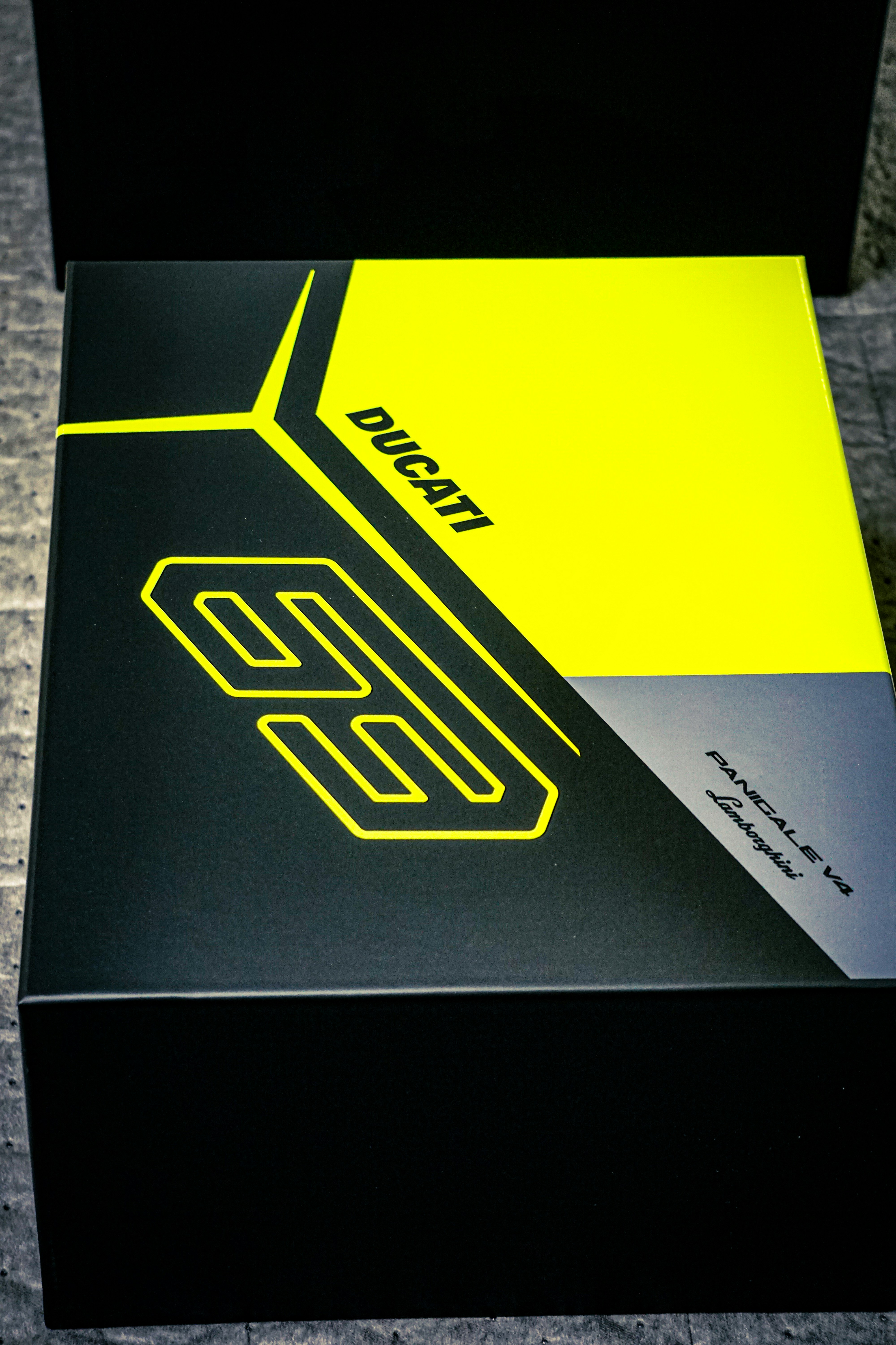 Black and yellow ducati box with graphic design