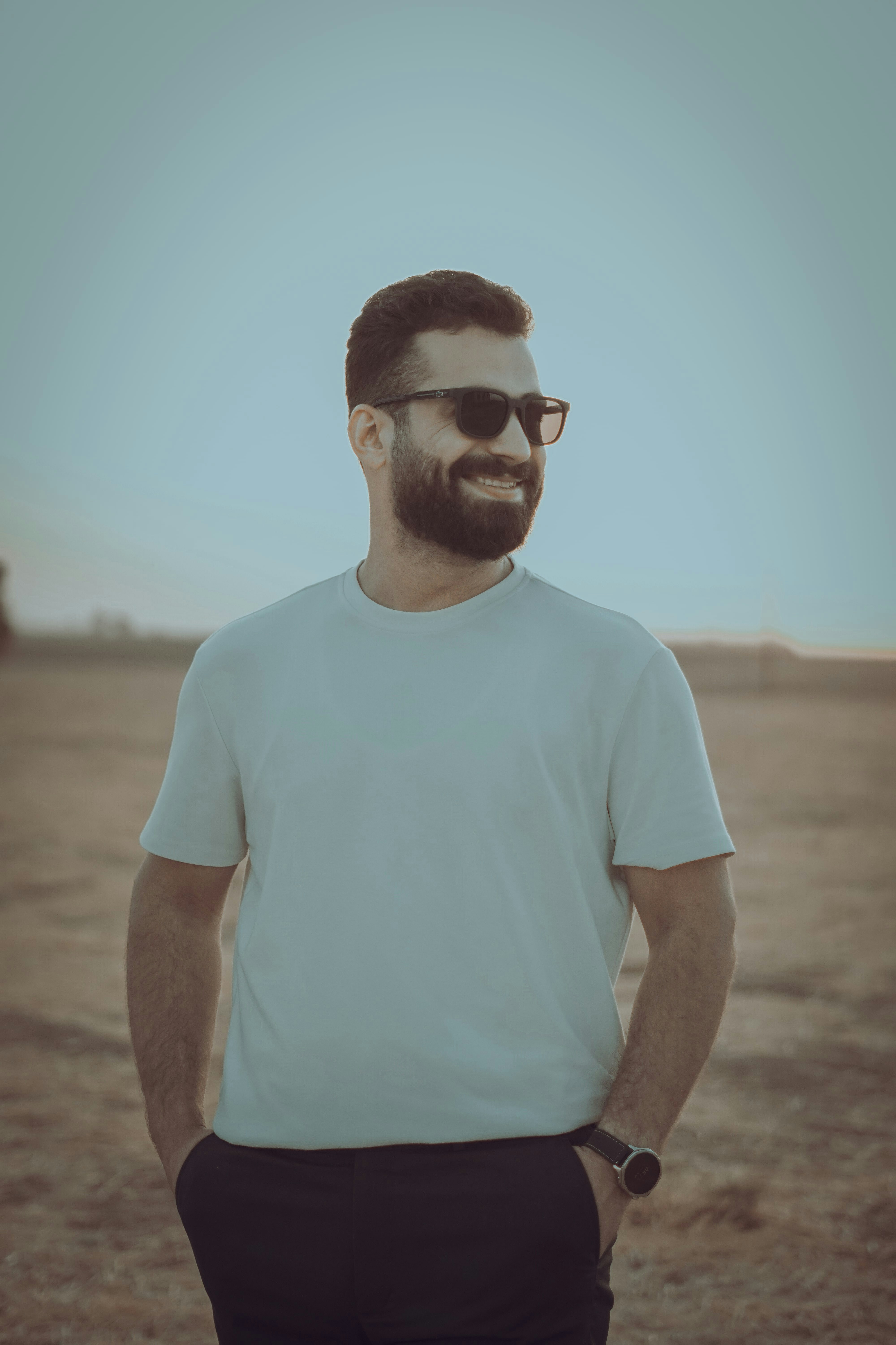 Man with sunglasses standing outdoors