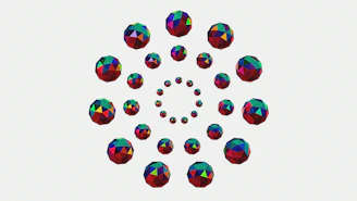 Colorful geometric spheres arranged in concentric circles.