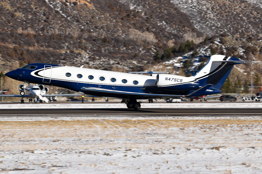 Mid-size private jet on tarmac, Challenger 350 charter worldwide