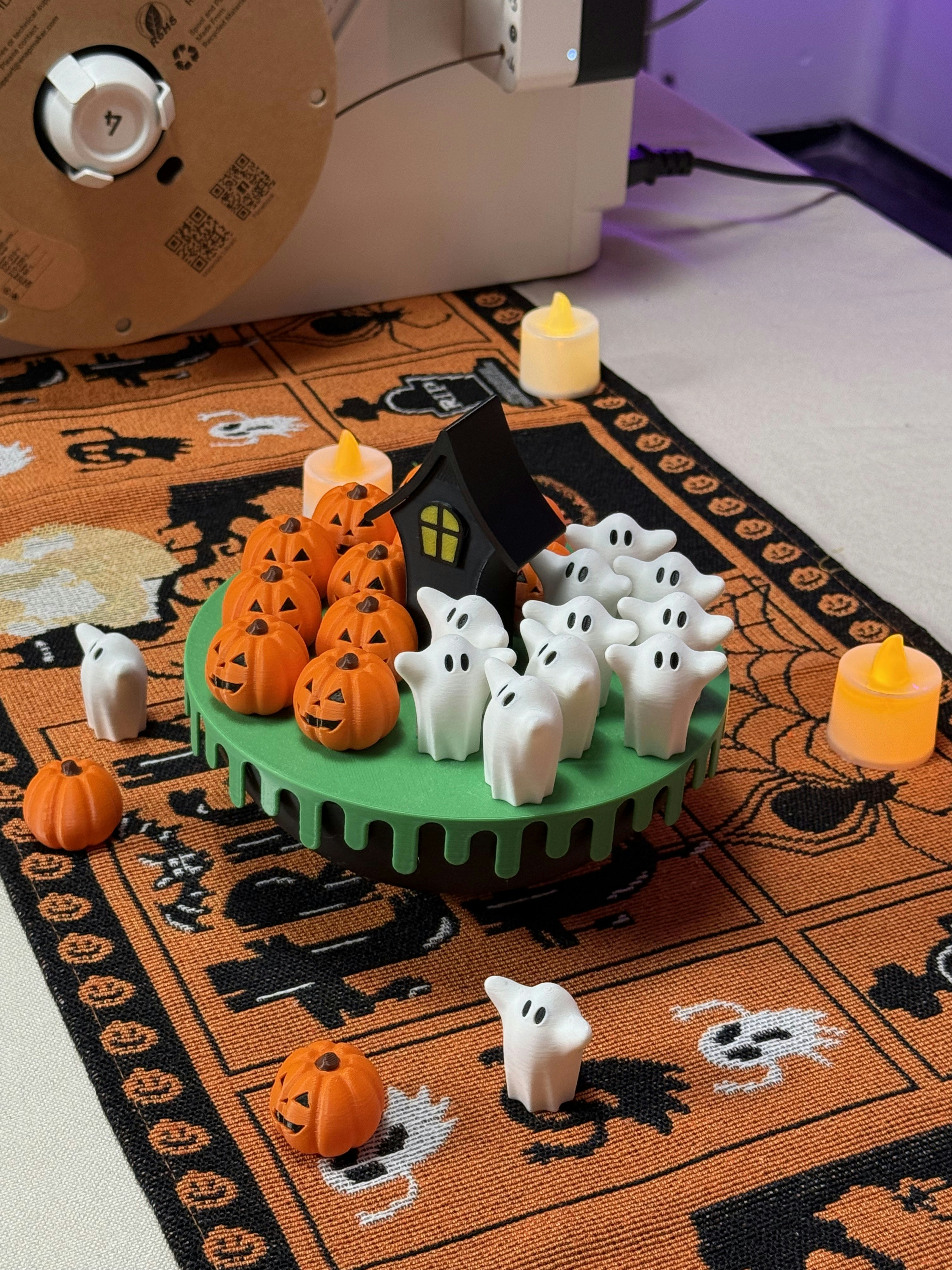 Halloween decorations with pumpkins and ghosts