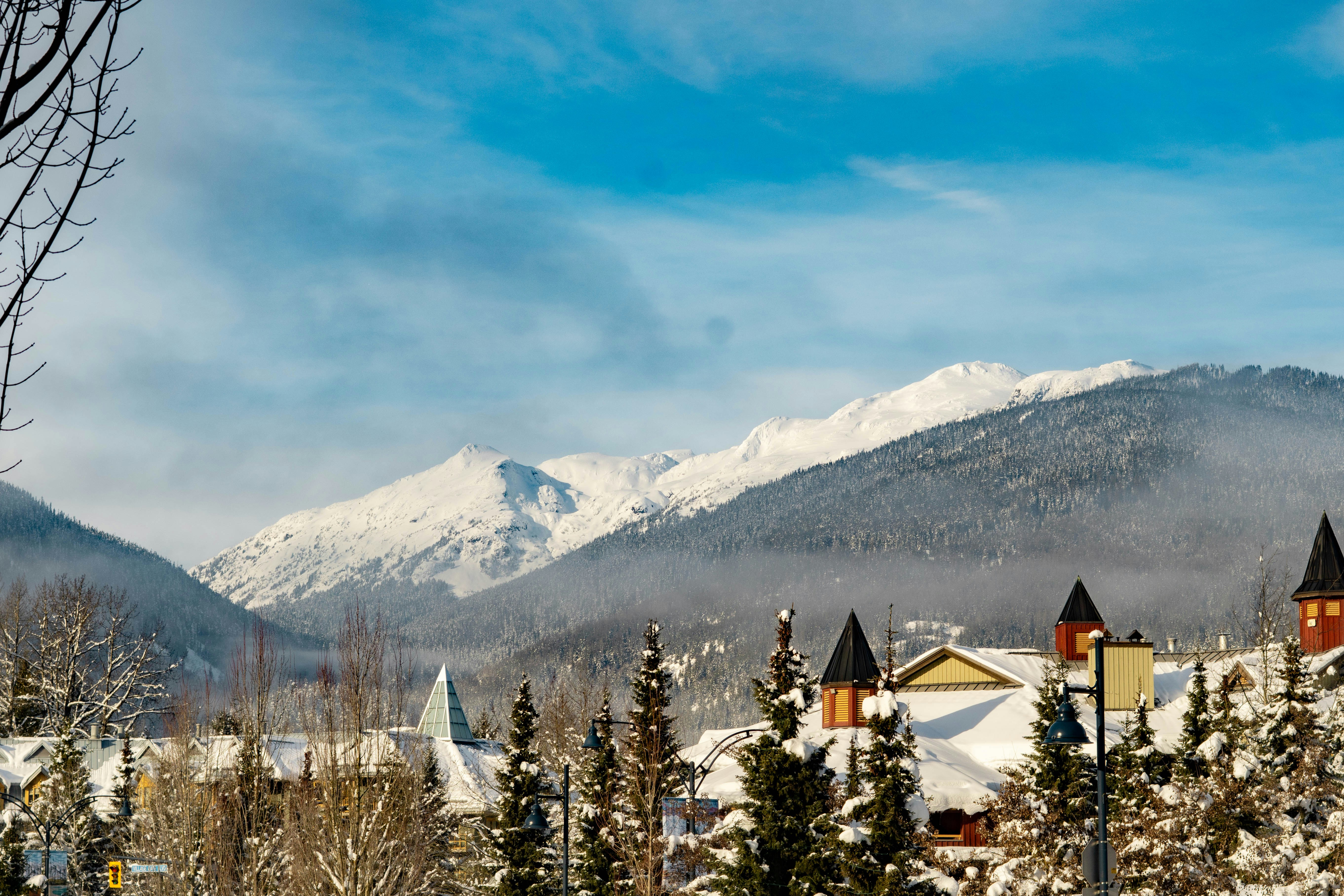 Whistler village in winter with snowy mountains