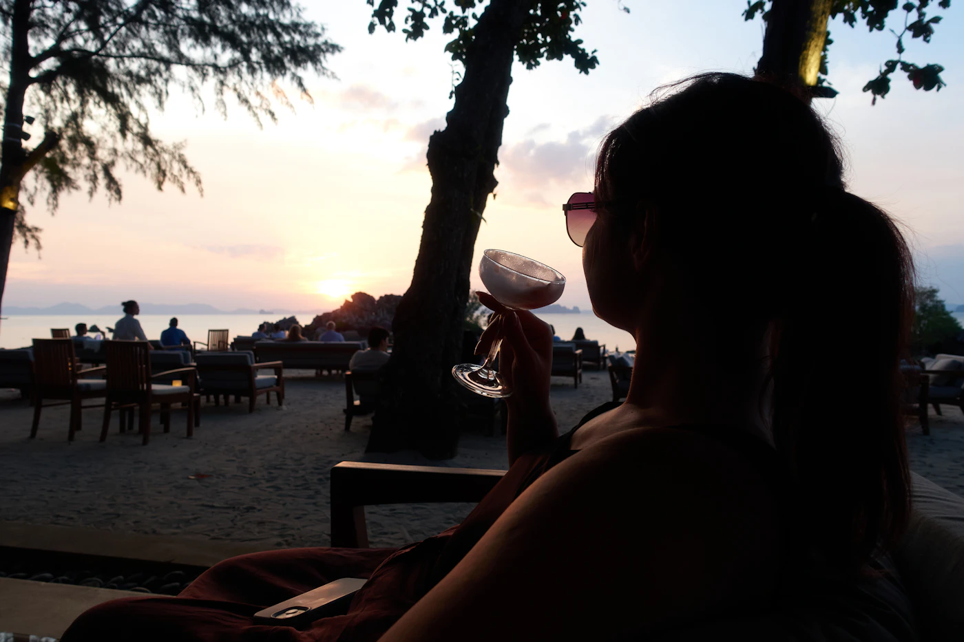 Guest enjoying sunset on the beach