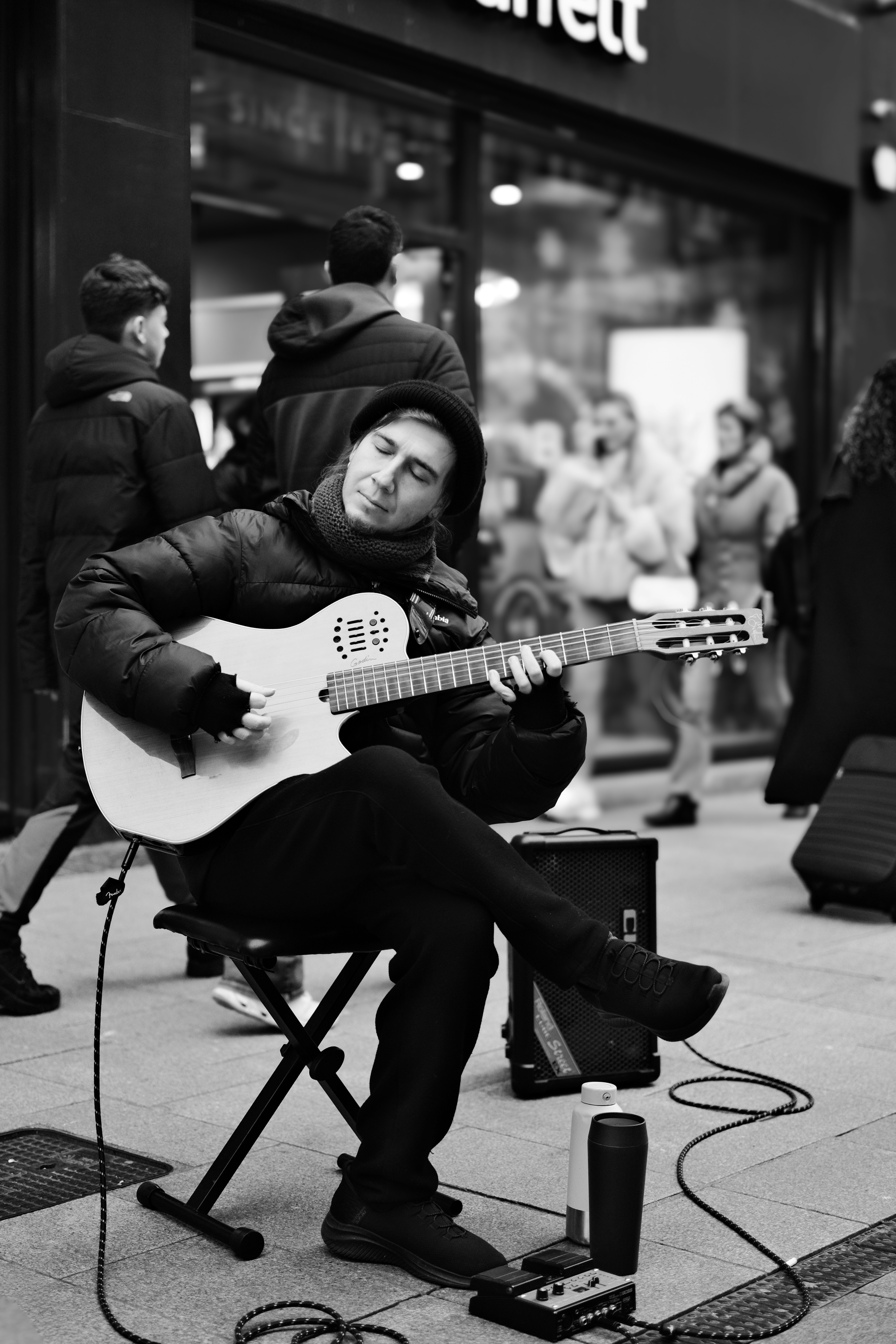 Man playing guitar on the street