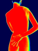 Thermographic view of a person's back and arm.