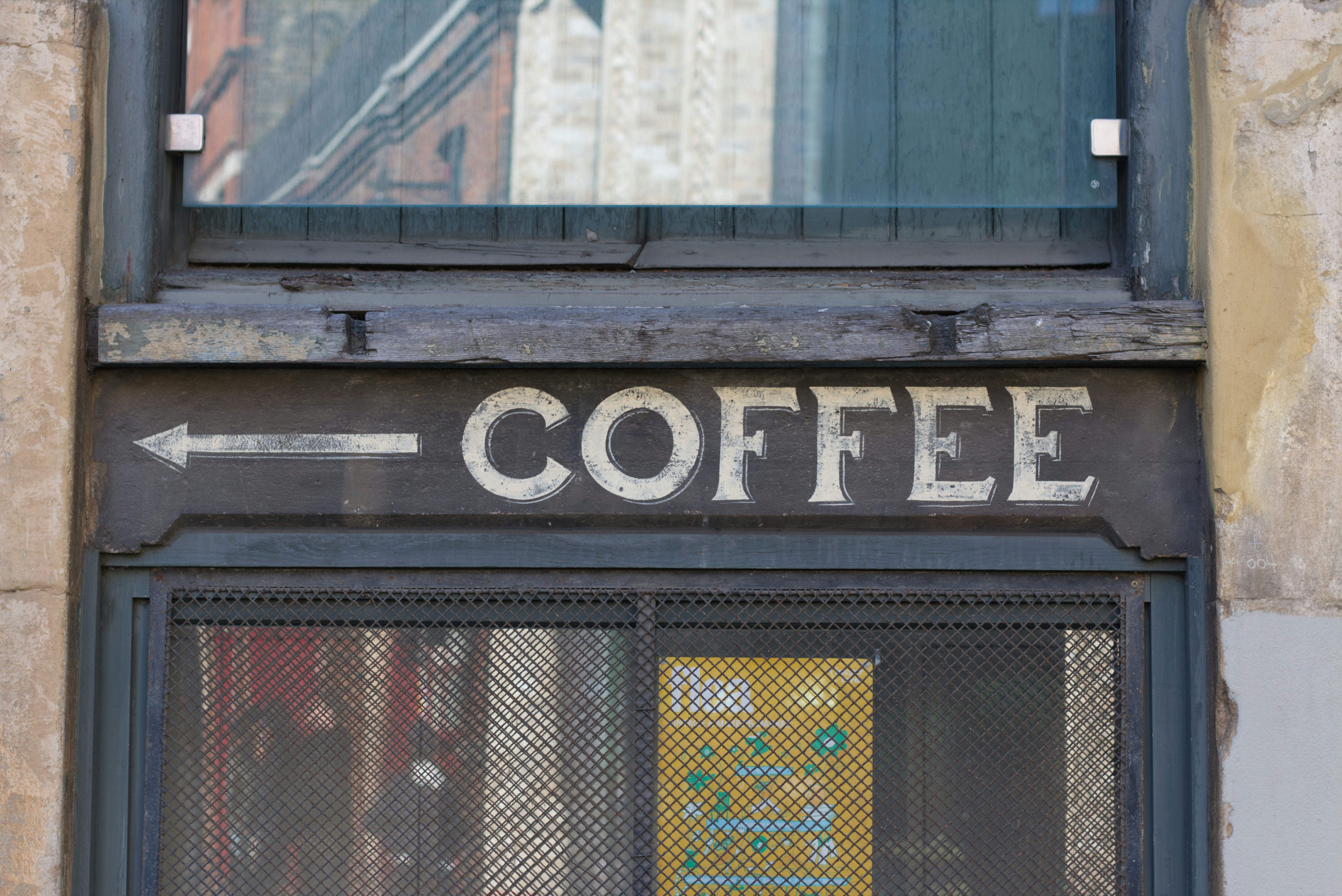 Arrow pointing left towards the word coffee