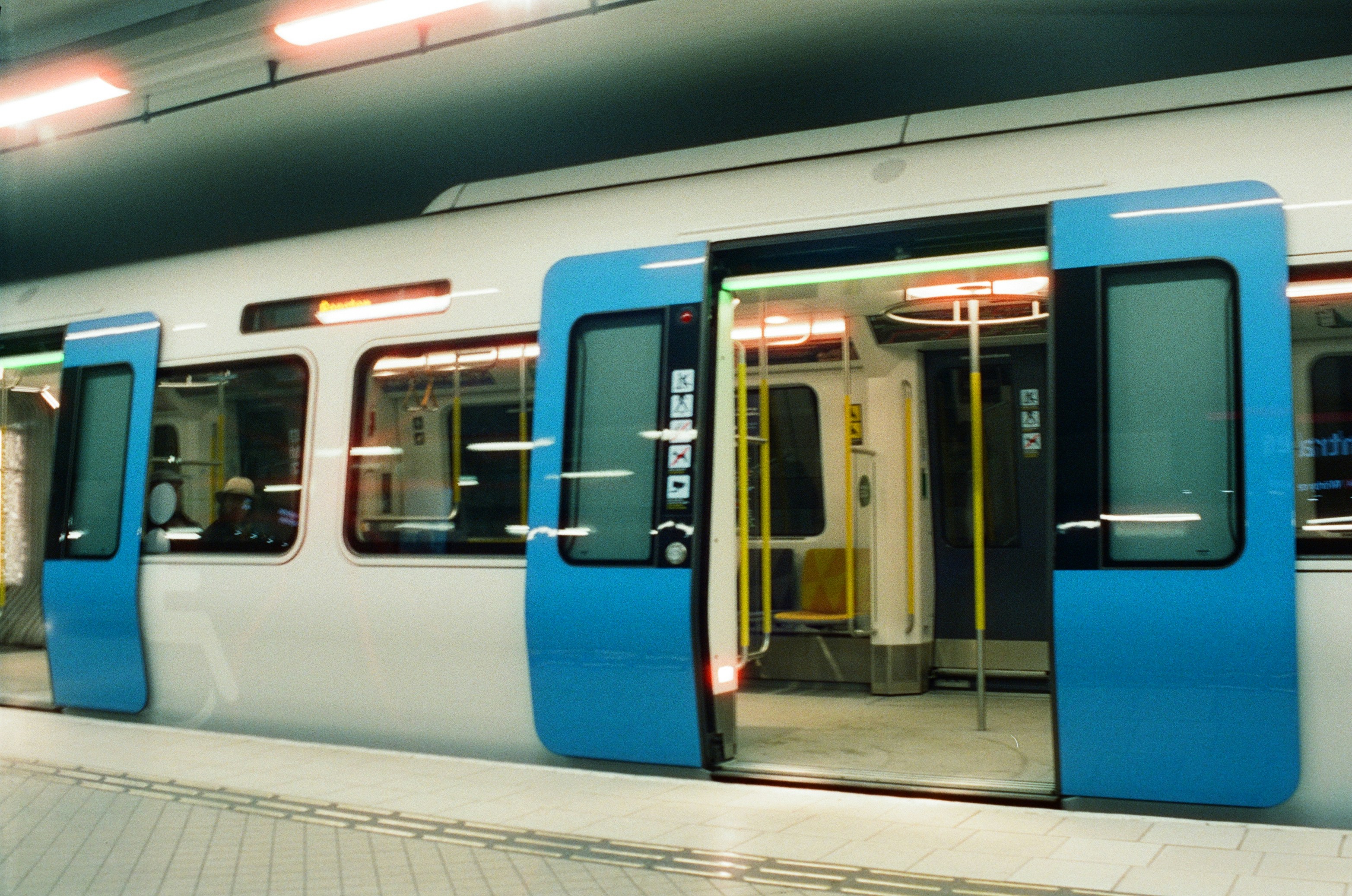 Public transit bus on city street, illustrating urban transportation campaigns