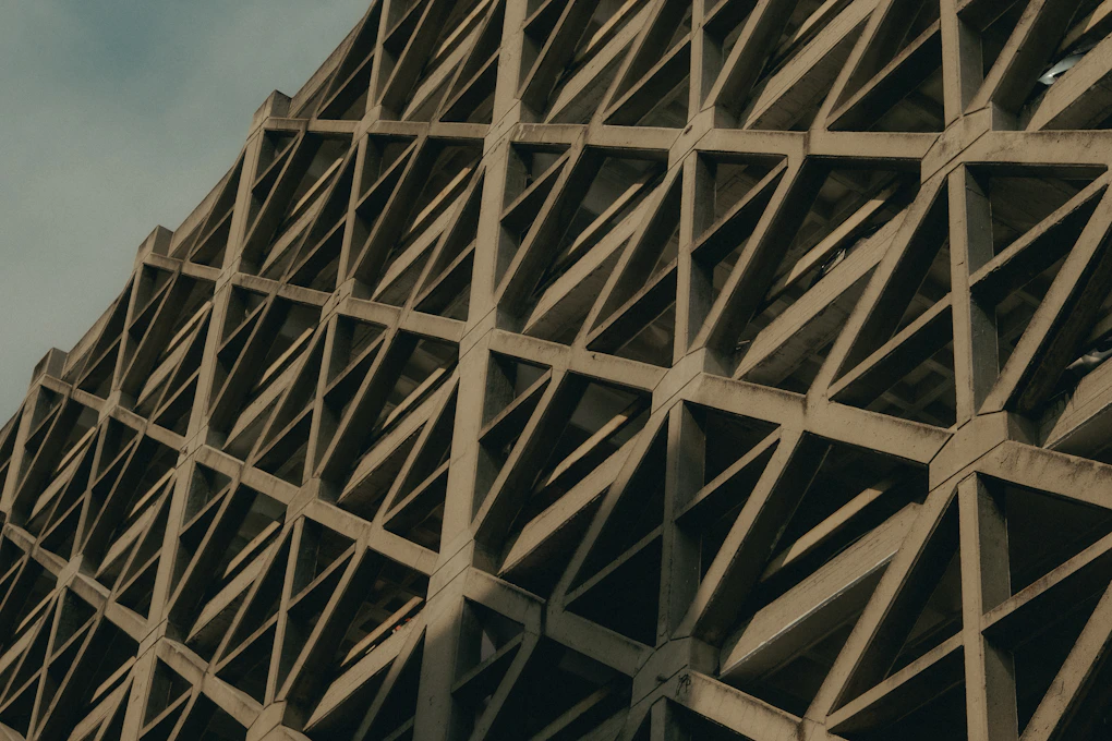 Geometric concrete building facade with repeating patterns