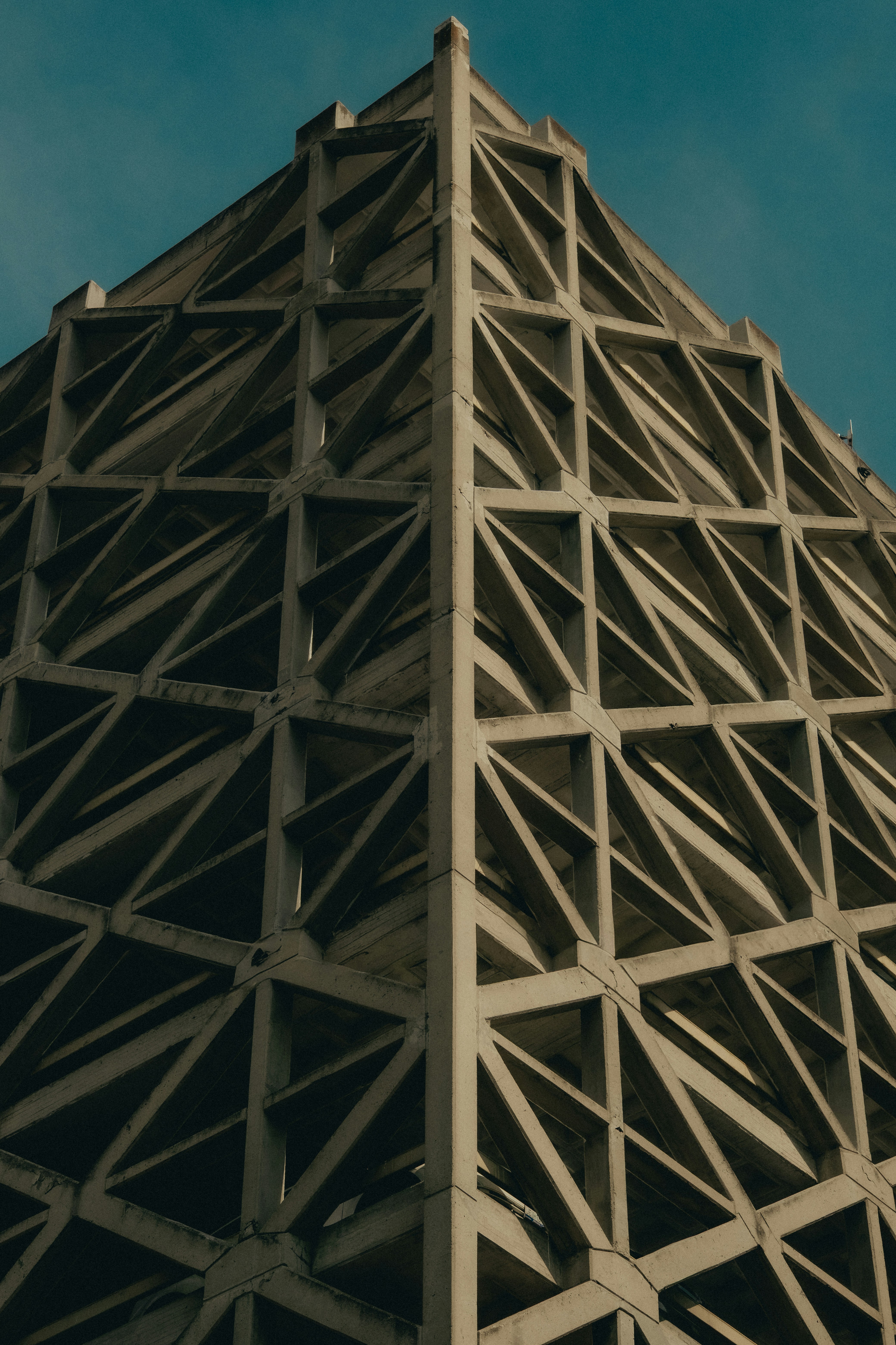 Geometric concrete building against a blue sky