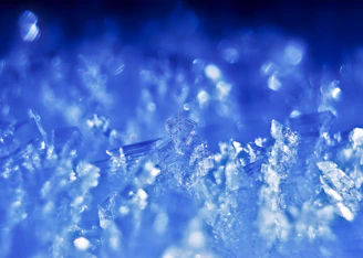 Close-up of blue ice crystals with bokeh
