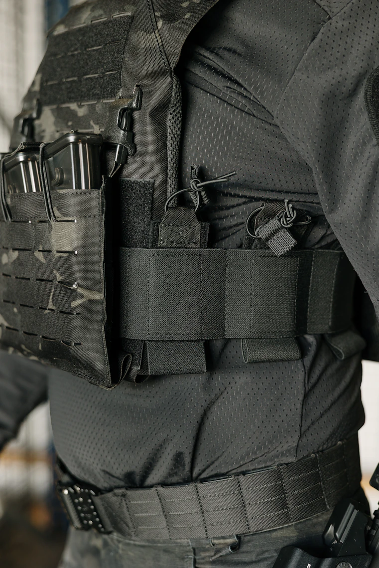 Tactical vest with pouches and magazines