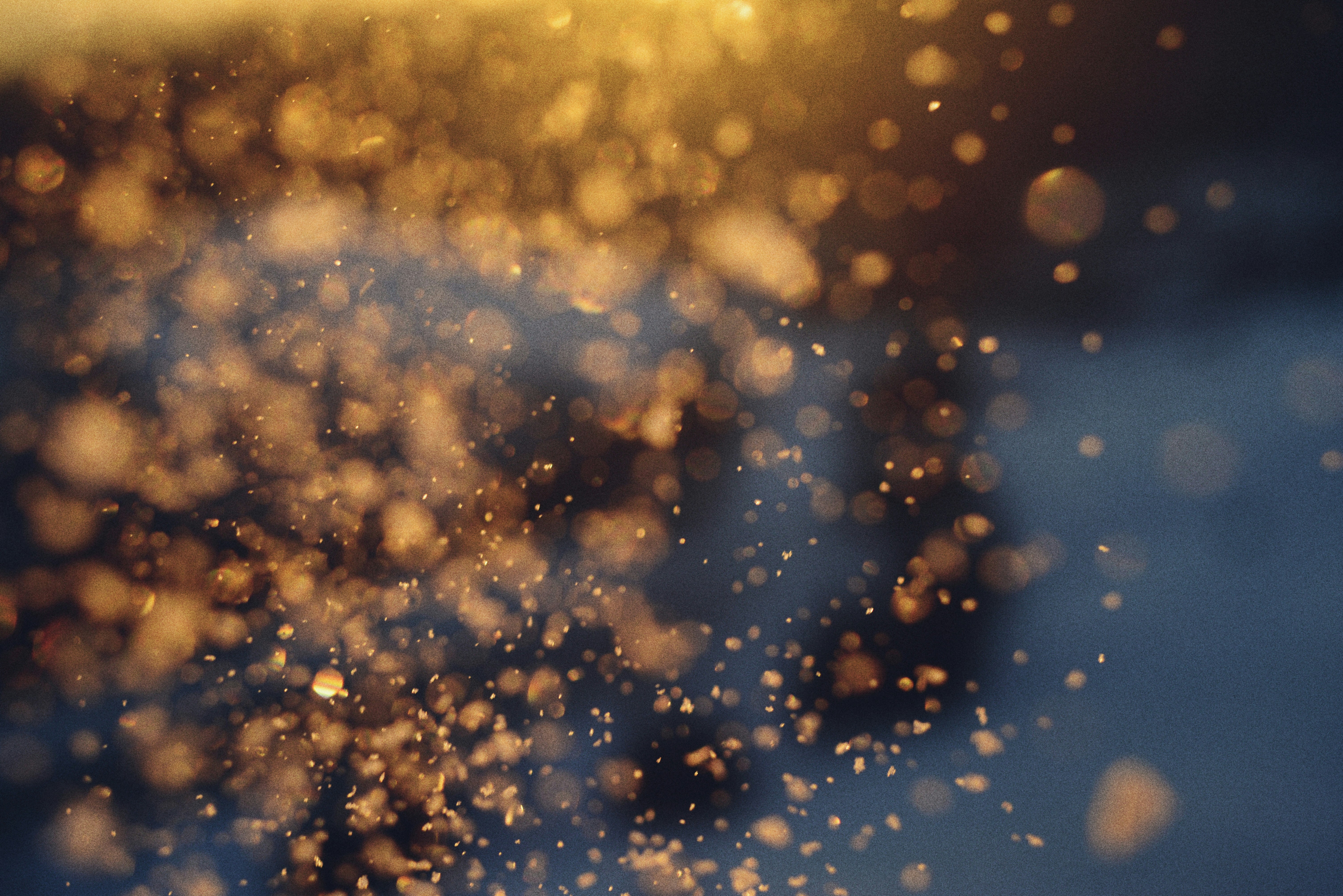 Golden particles floating in the air